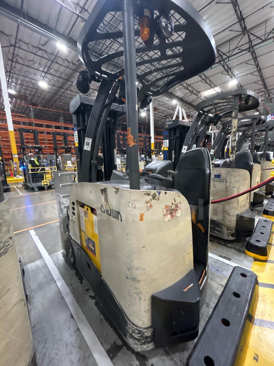 Crown RC 5500 Series Stand-Up Electric Forklift with Carton Clamp Crown 5500 Government Surplus Auction - Photo #6