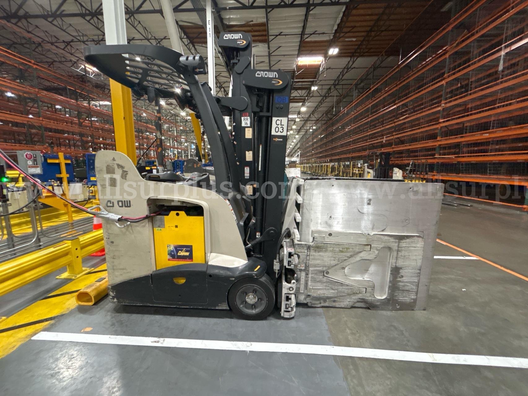 Crown RC 5500 Series Stand-Up Electric Forklift with Carton Clamp Crown 5500 Government Surplus Auction - Photo #2