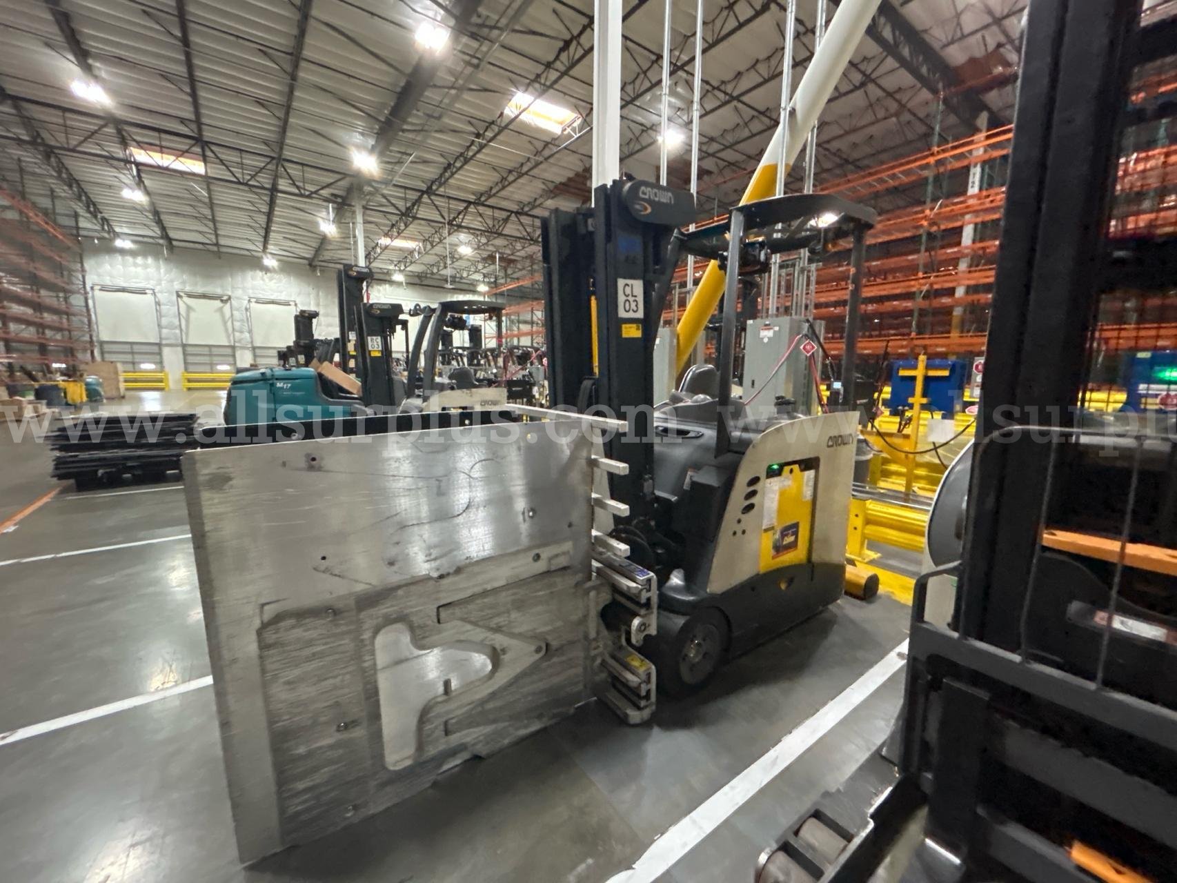 Crown RC 5500 Series Stand-Up Electric Forklift with Carton Clamp Crown 5500 Government Surplus Auction - Photo #4