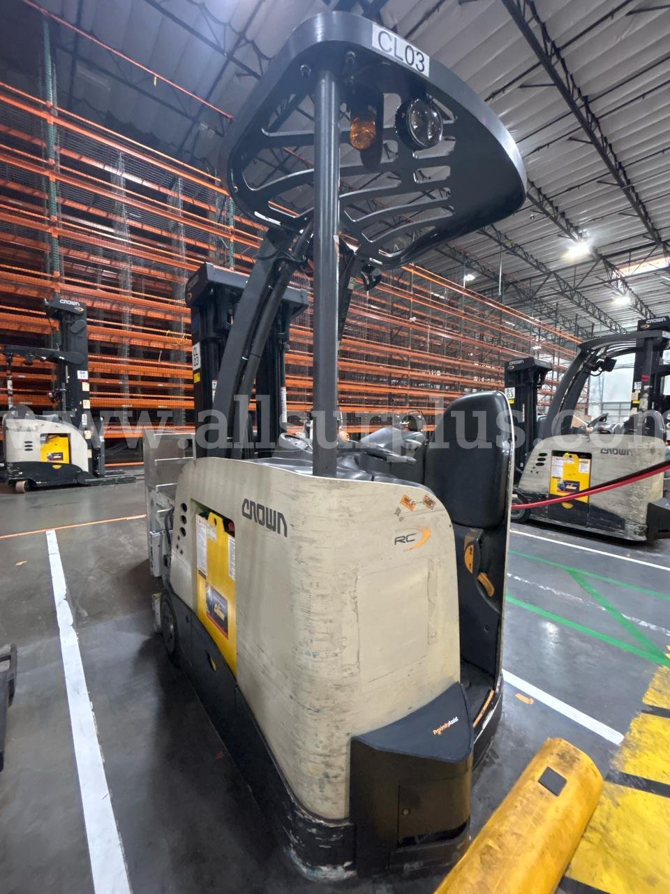 Crown RC 5500 Series Stand-Up Electric Forklift with Carton Clamp Crown 5500 Government Surplus Auction - Photo #5