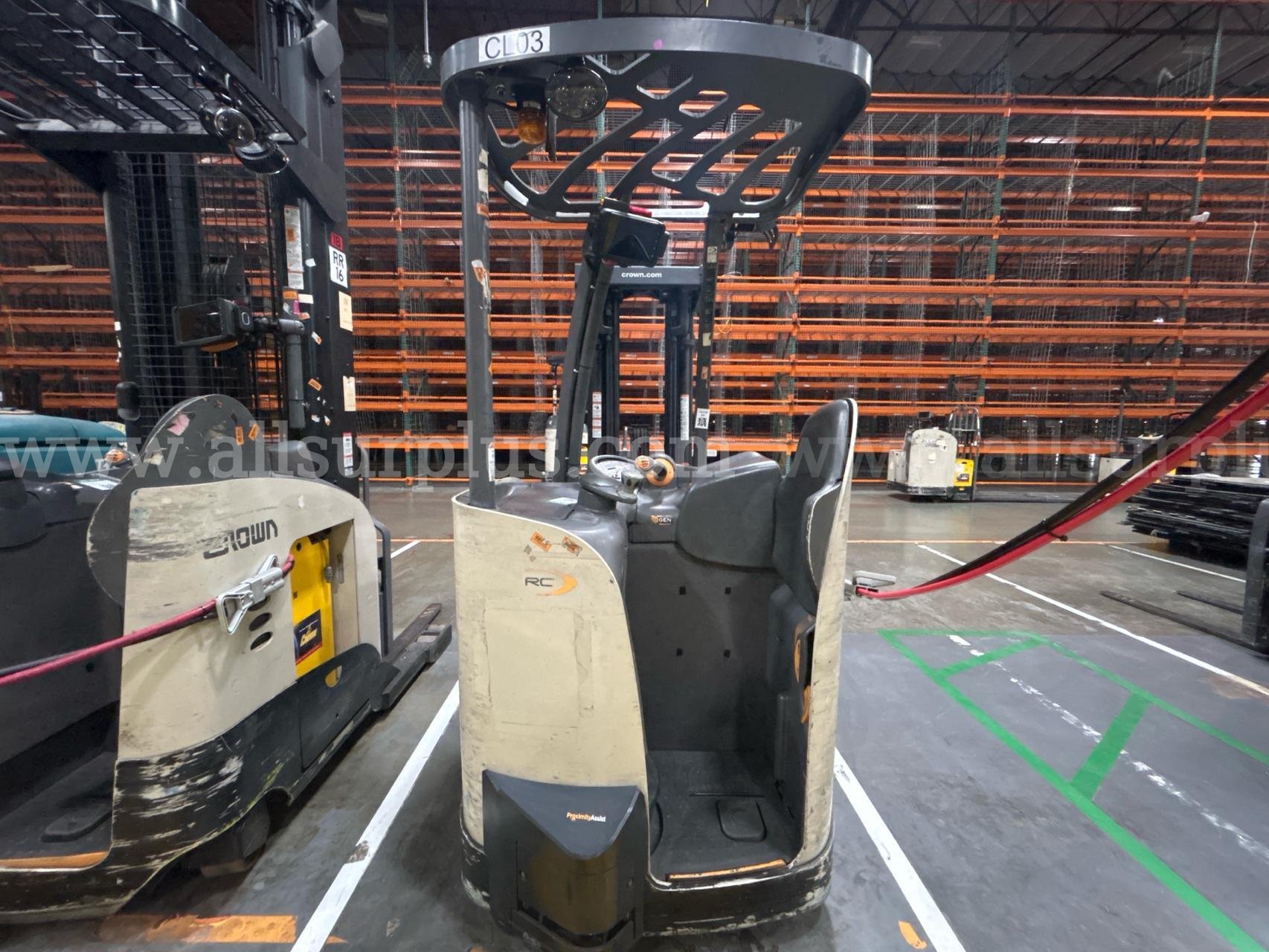 Crown RC 5500 Series Stand-Up Electric Forklift with Carton Clamp Crown 5500 Government Surplus Auction - Photo #6