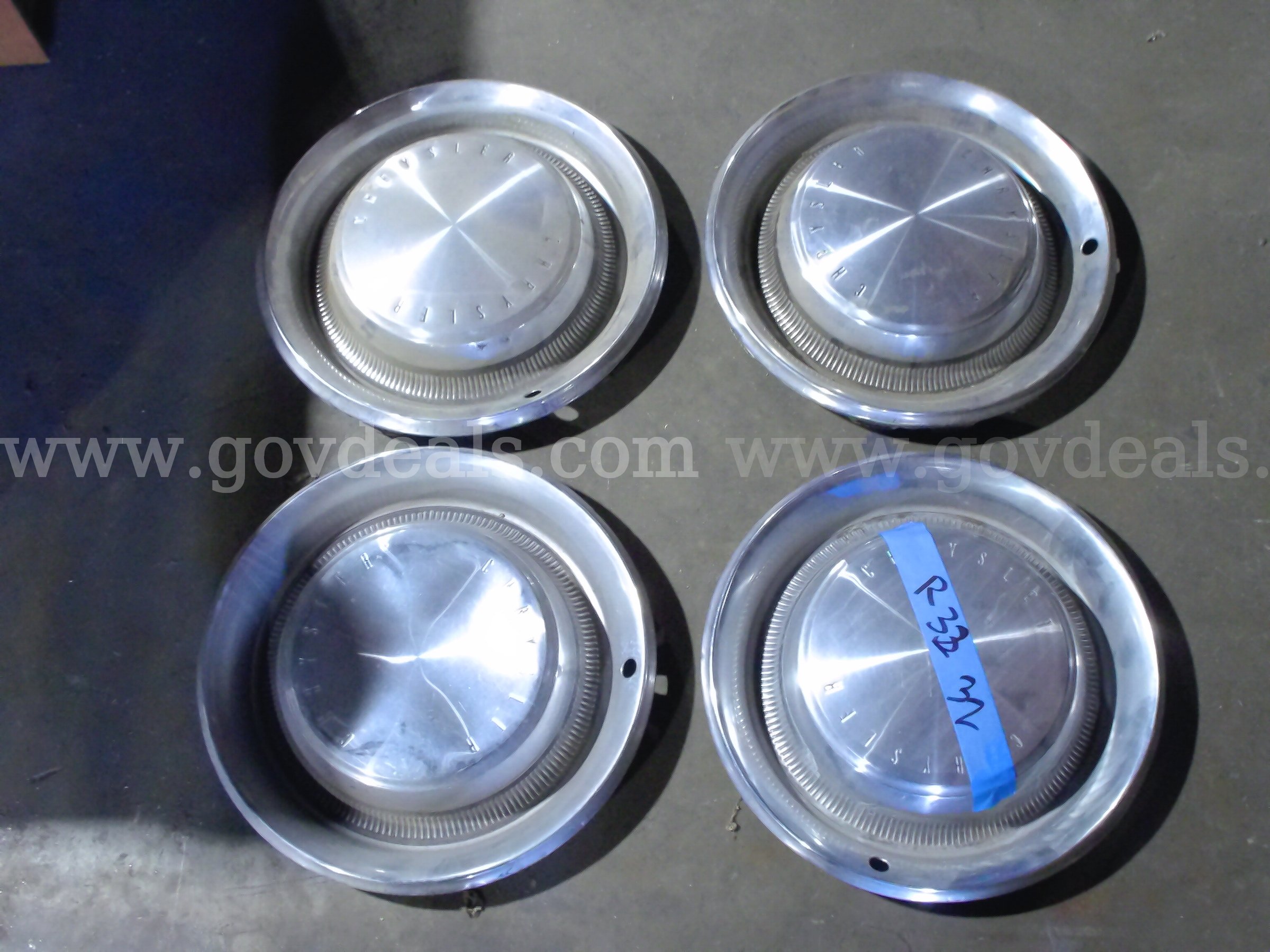 15 inch Chrysler hubcaps   Government Surplus Auction - Primary Photo