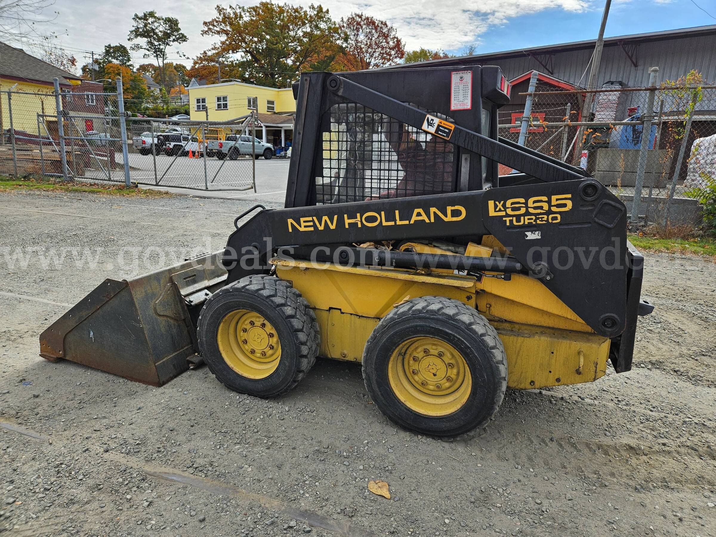 1996 New Holland LX665 Skid Steer Loader New Holland LX665 Government Surplus Auction - Photo #2