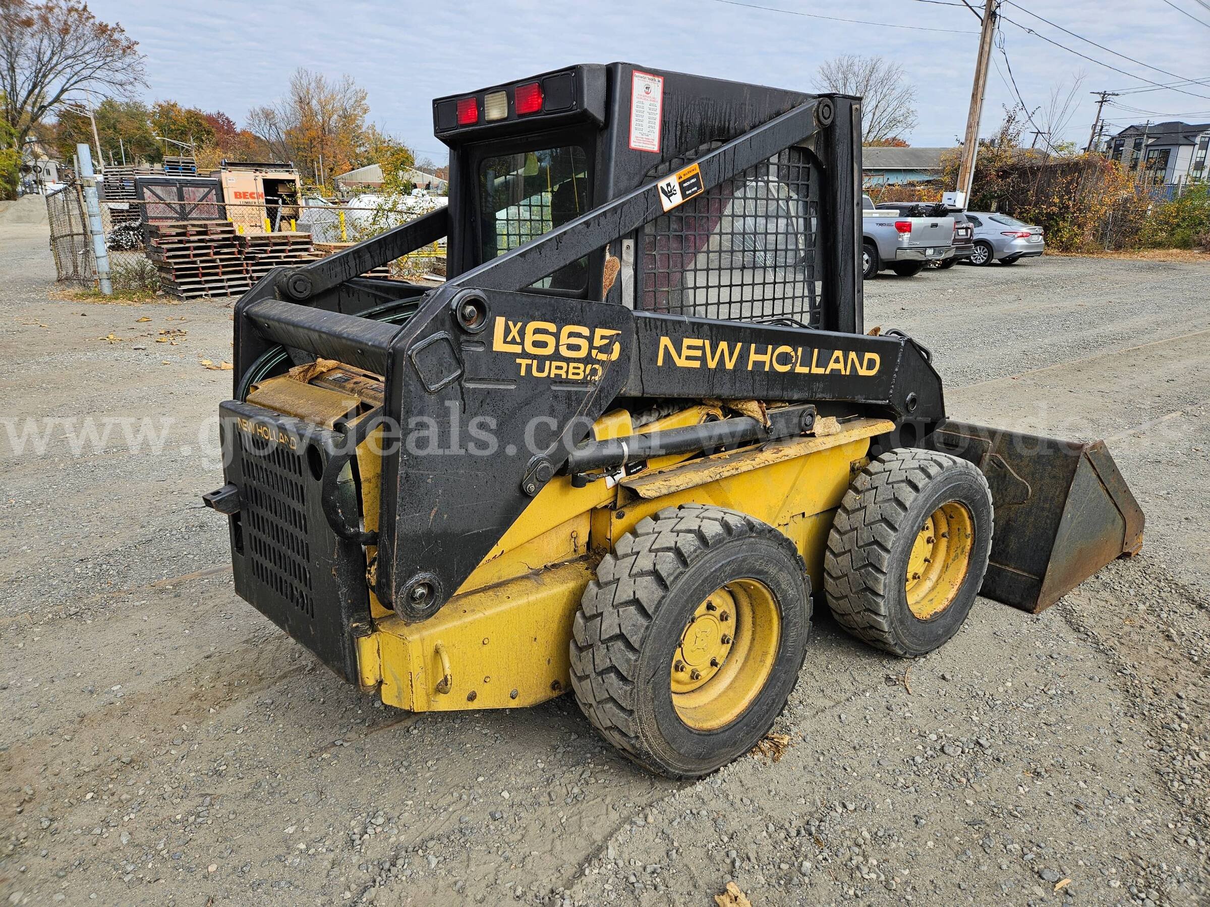 1996 New Holland LX665 Skid Steer Loader New Holland LX665 Government Surplus Auction - Photo #3