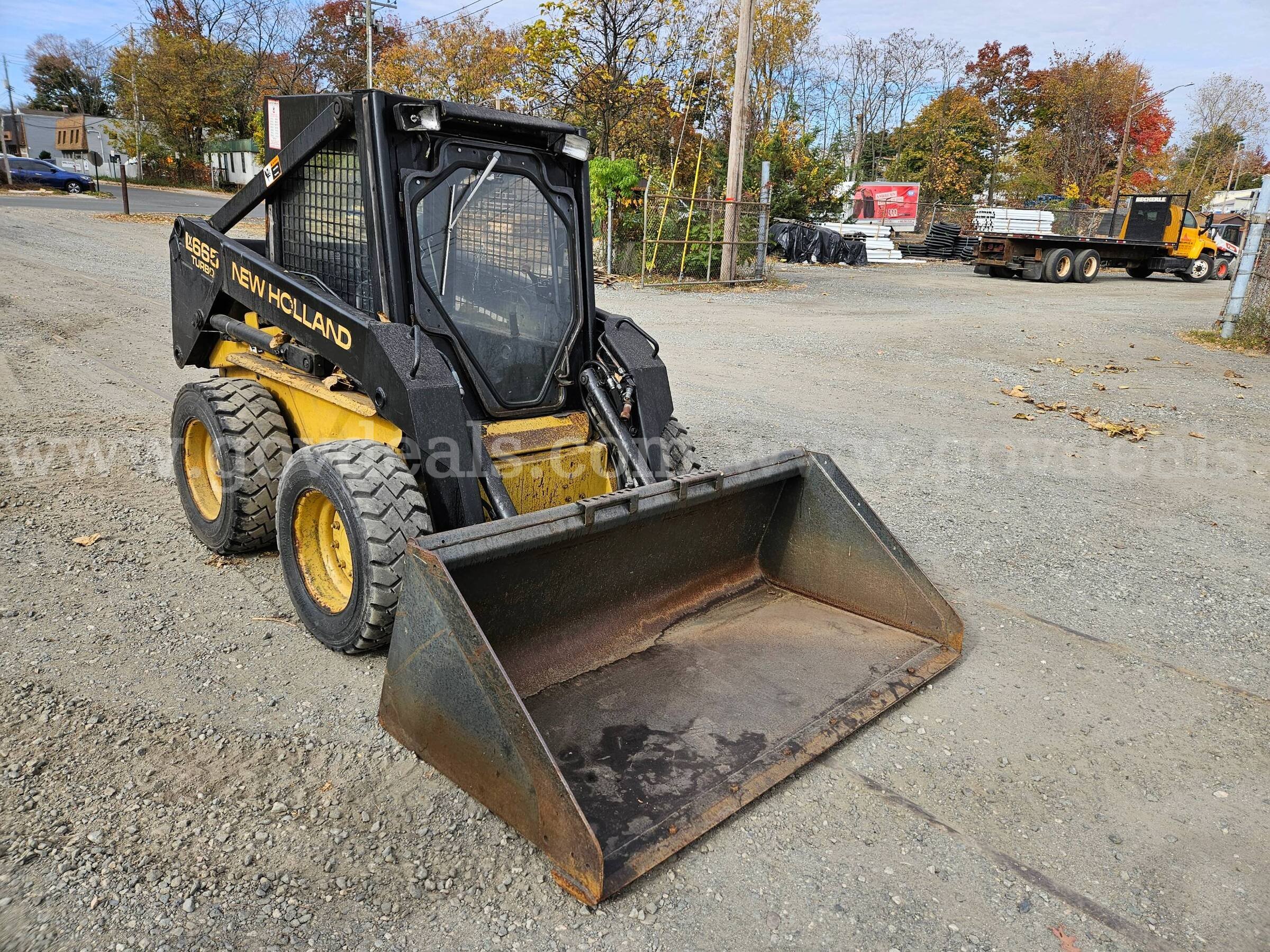 1996 New Holland LX665 Skid Steer Loader New Holland LX665 Government Surplus Auction - Photo #5