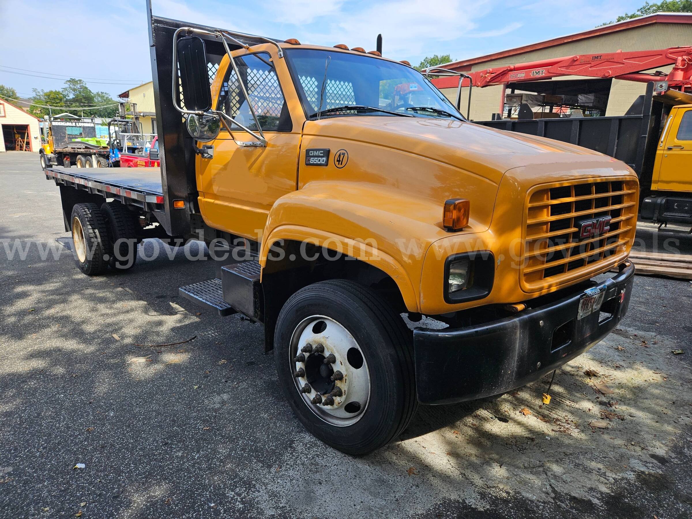 1998 GMC C6500 16FT Flatbed Dump Truck GMC C6500 Government Surplus Auction - Photo #2
