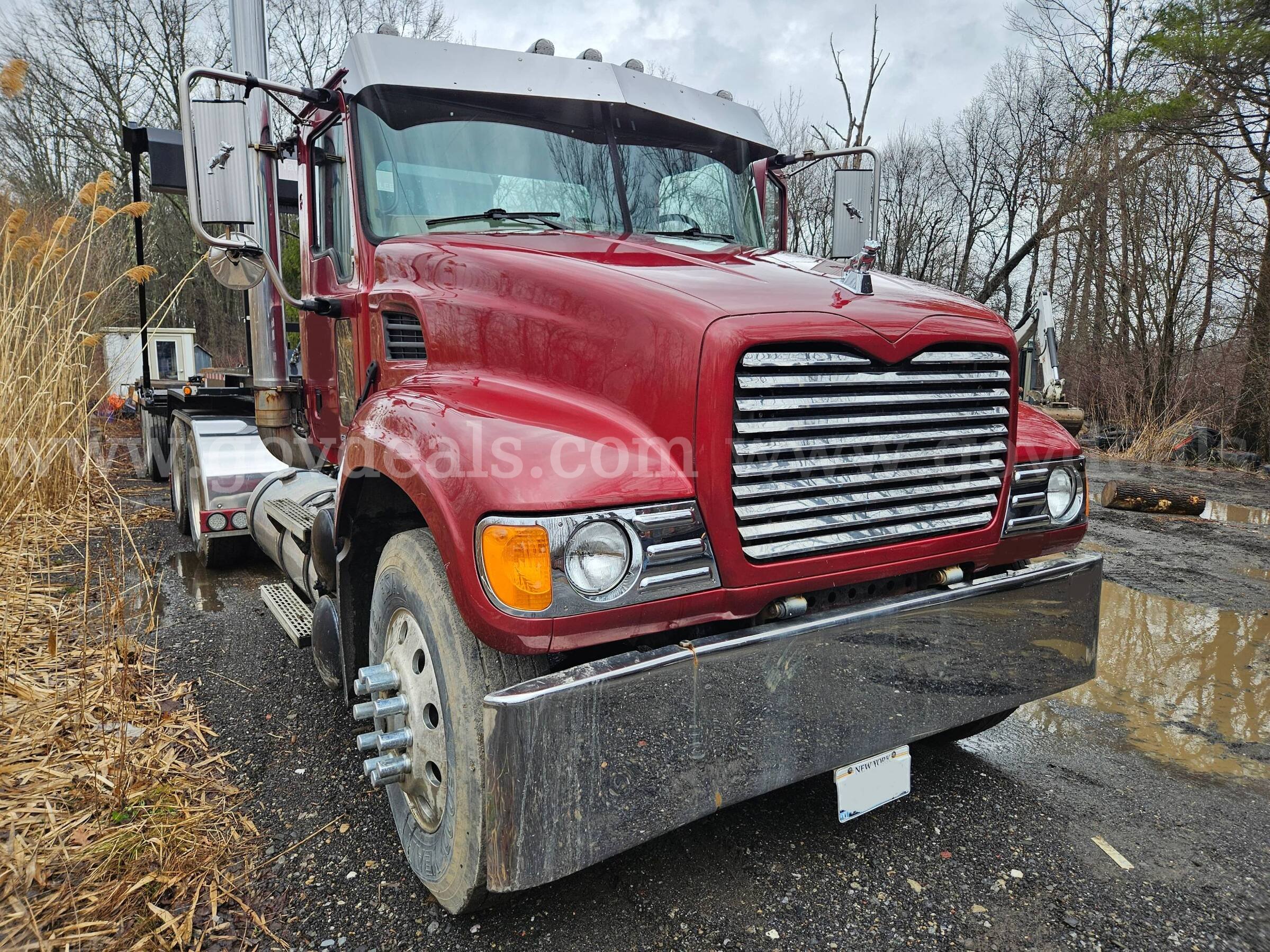 2003 Mack CV713 Granite Tandem Axle Day Cab Tractor With Wetline Mack CV713 Government Surplus Auction - Primary Photo