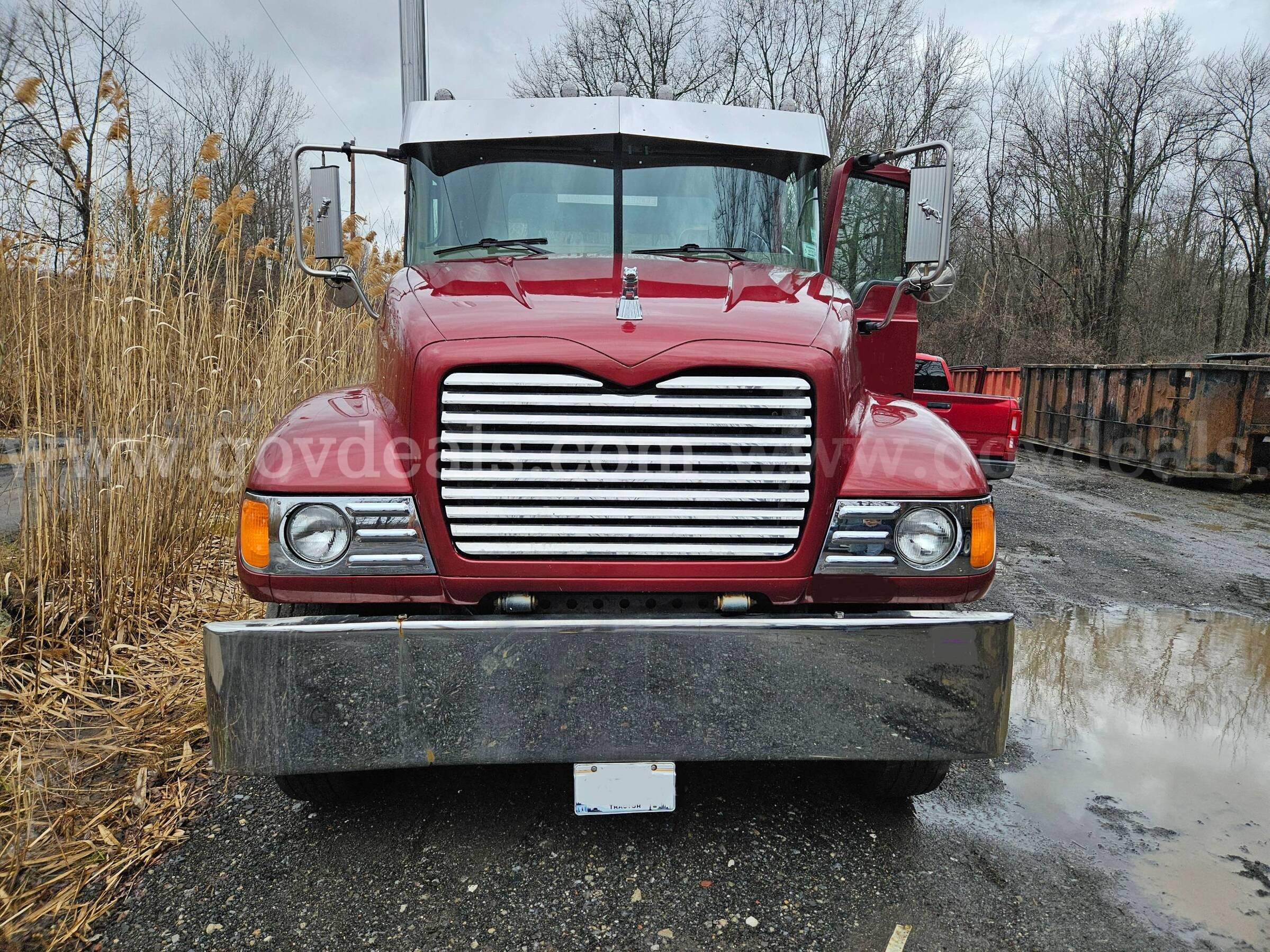 2003 Mack CV713 Granite Tandem Axle Day Cab Tractor With Wetline Mack CV713 Government Surplus Auction - Photo #2