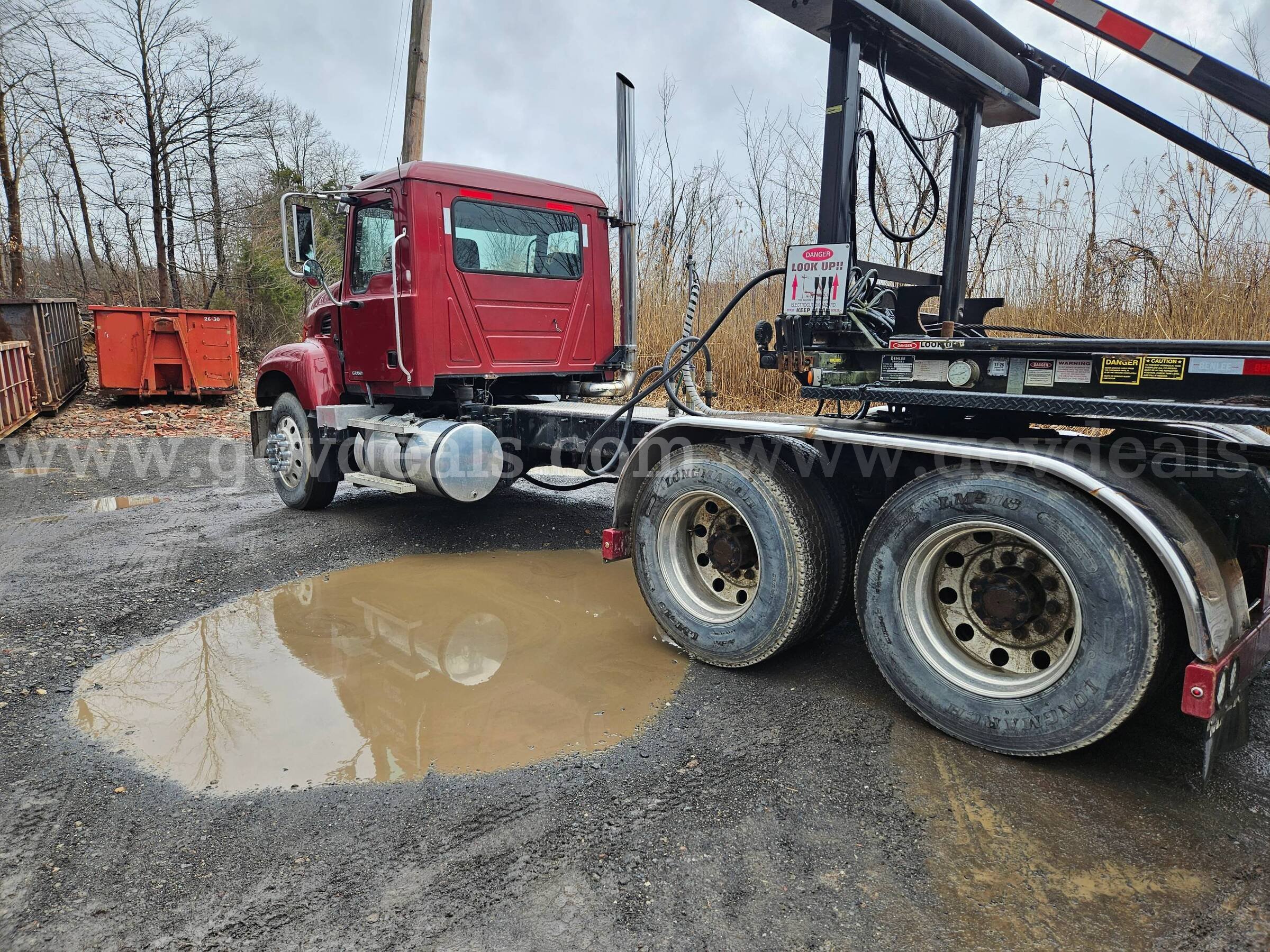 2003 Mack CV713 Granite Tandem Axle Day Cab Tractor With Wetline Mack CV713 Government Surplus Auction - Photo #3