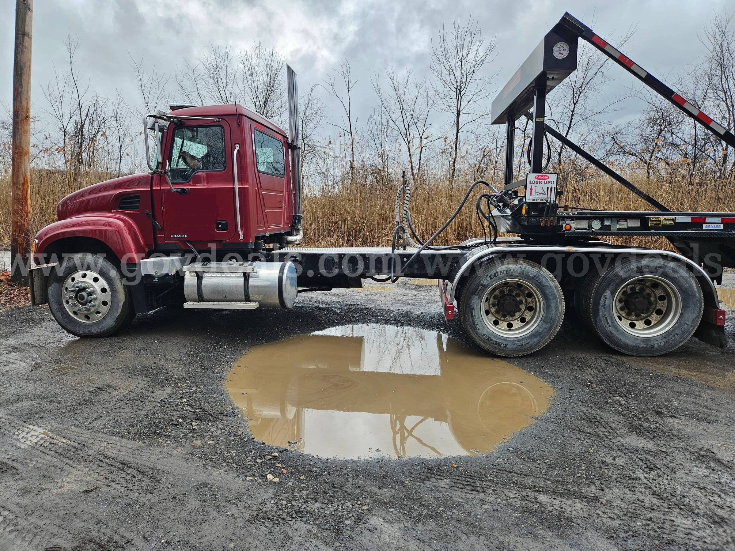 2003 Mack CV713 Granite Tandem Axle Day Cab Tractor With Wetline Mack CV713 Government Surplus Auction - Photo #4