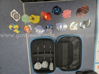 Case of 3 electronic game darts and extra flights unknown  Government Surplus Auction - Primary Photo