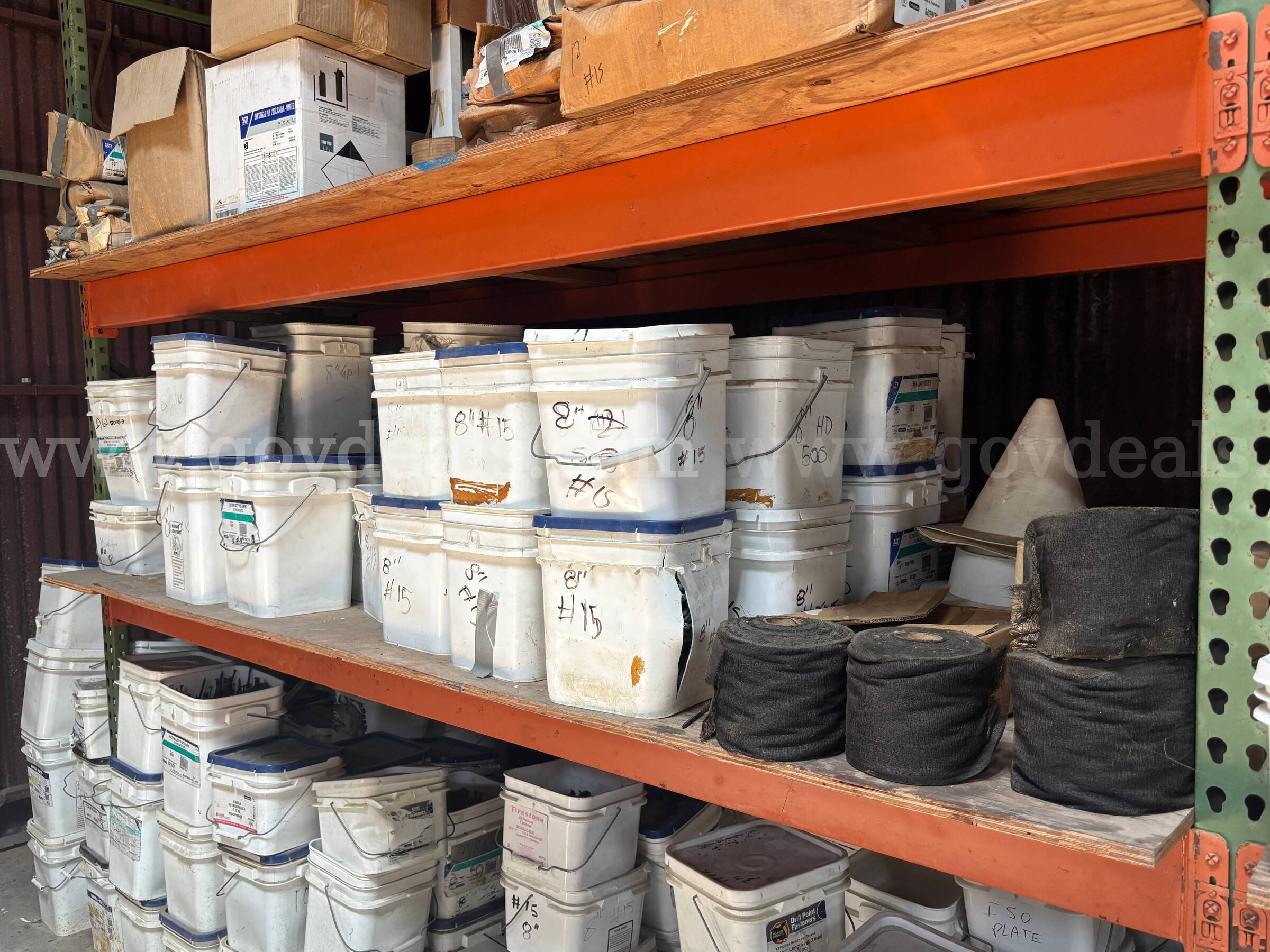 Approx 60 buckets of 8" roofing fasteners open and unopen boxes (unused)   Government Surplus Auction - Primary Photo
