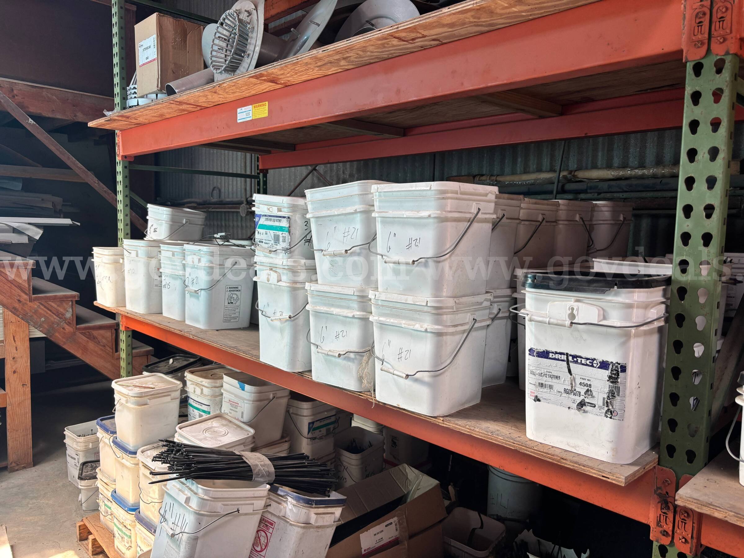 Approx 52 buckets of 3" to 7" unused roofing fasteners   Government Surplus Auction - Primary Photo