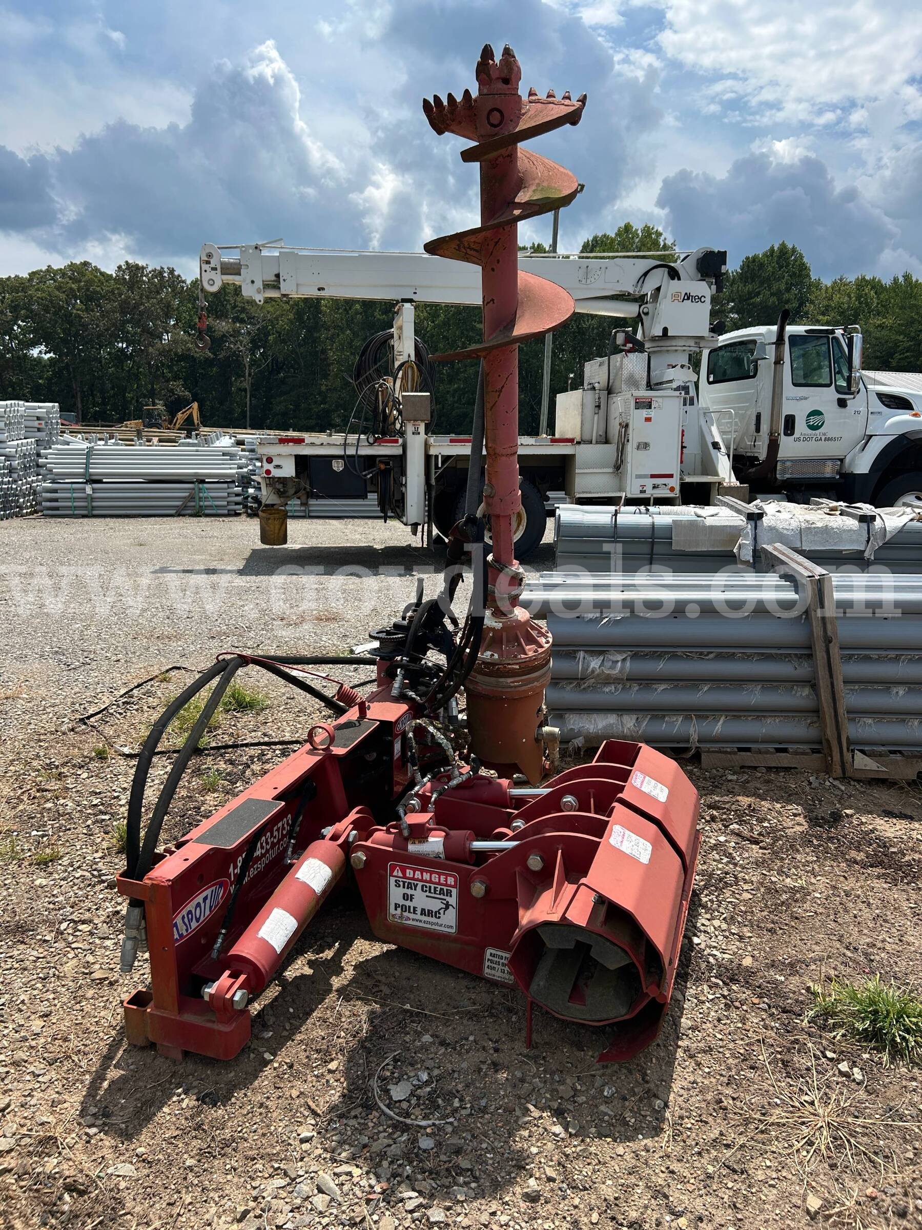 ez spot pole setter skid steer attachment