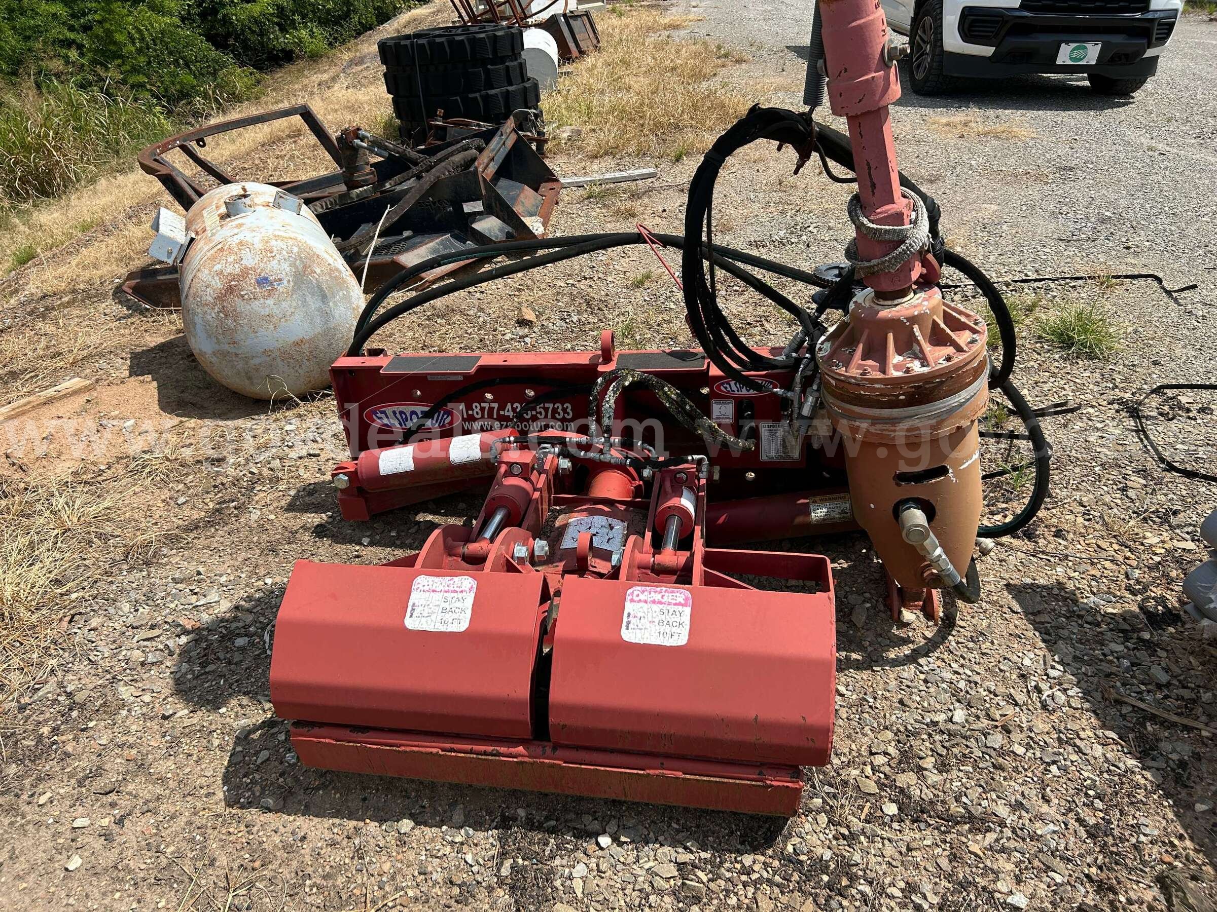 ez spot pole setter skid steer attachment ez spot  Government Surplus Auction - Photo #4