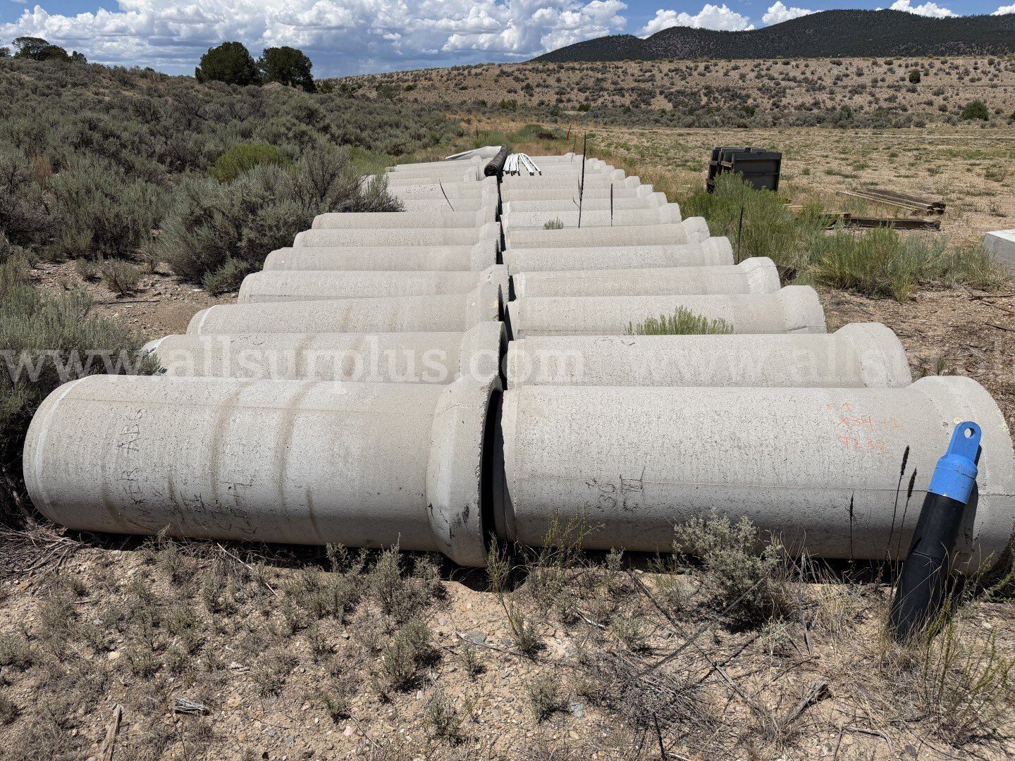 Concrete Drainage Pipe and Barriers, 30in Dia x 100in Pipe, Qty 52 Pcs, Parking Stops, Qty 76pcs, 1 LOT  100in Government Surplus Auction - Primary Photo