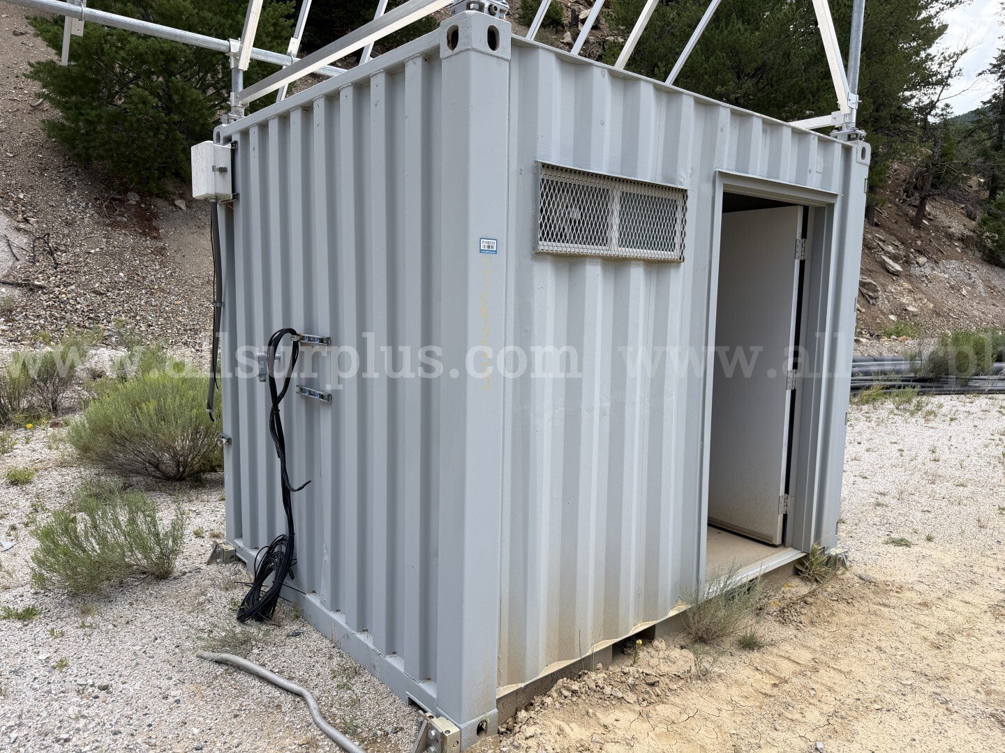 Shipping Container with Solar Power Generation Equipment, 10ft x 8.5ftx 8ft, Qty 1 Unit   Government Surplus Auction - Primary Photo