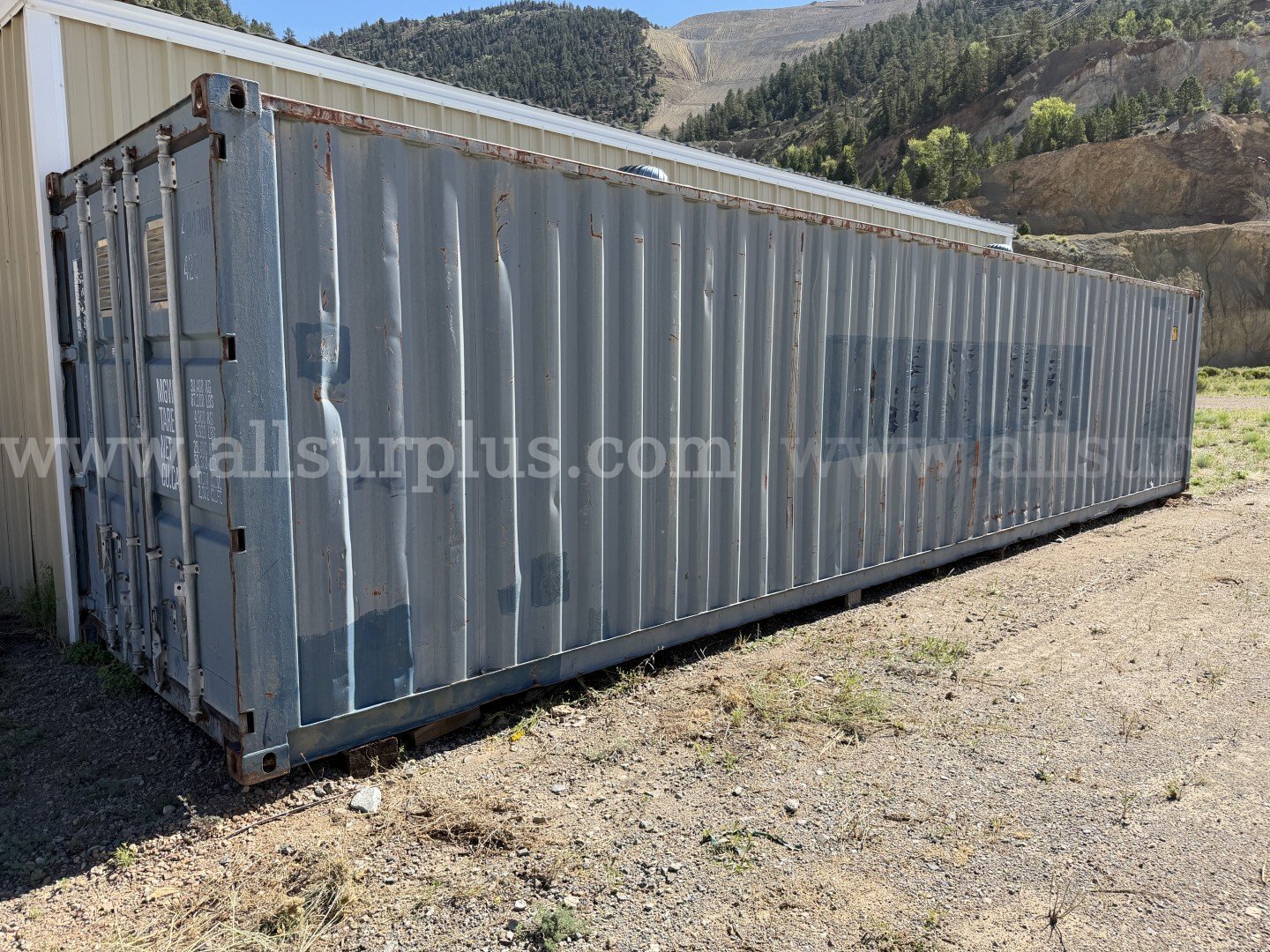 Shipping Container 40ft x 8.5ft x 8ft, With Contents, Qty 1.   Government Surplus Auction - Primary Photo