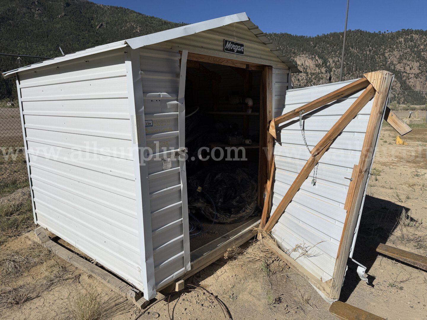 Skidded Portable Building with Flow Meters and Tubing, Qty 1, Skidded Portable Buildings, w/ Man Door , Qty 2, 1Lot   Government Surplus Auction - Primary Photo