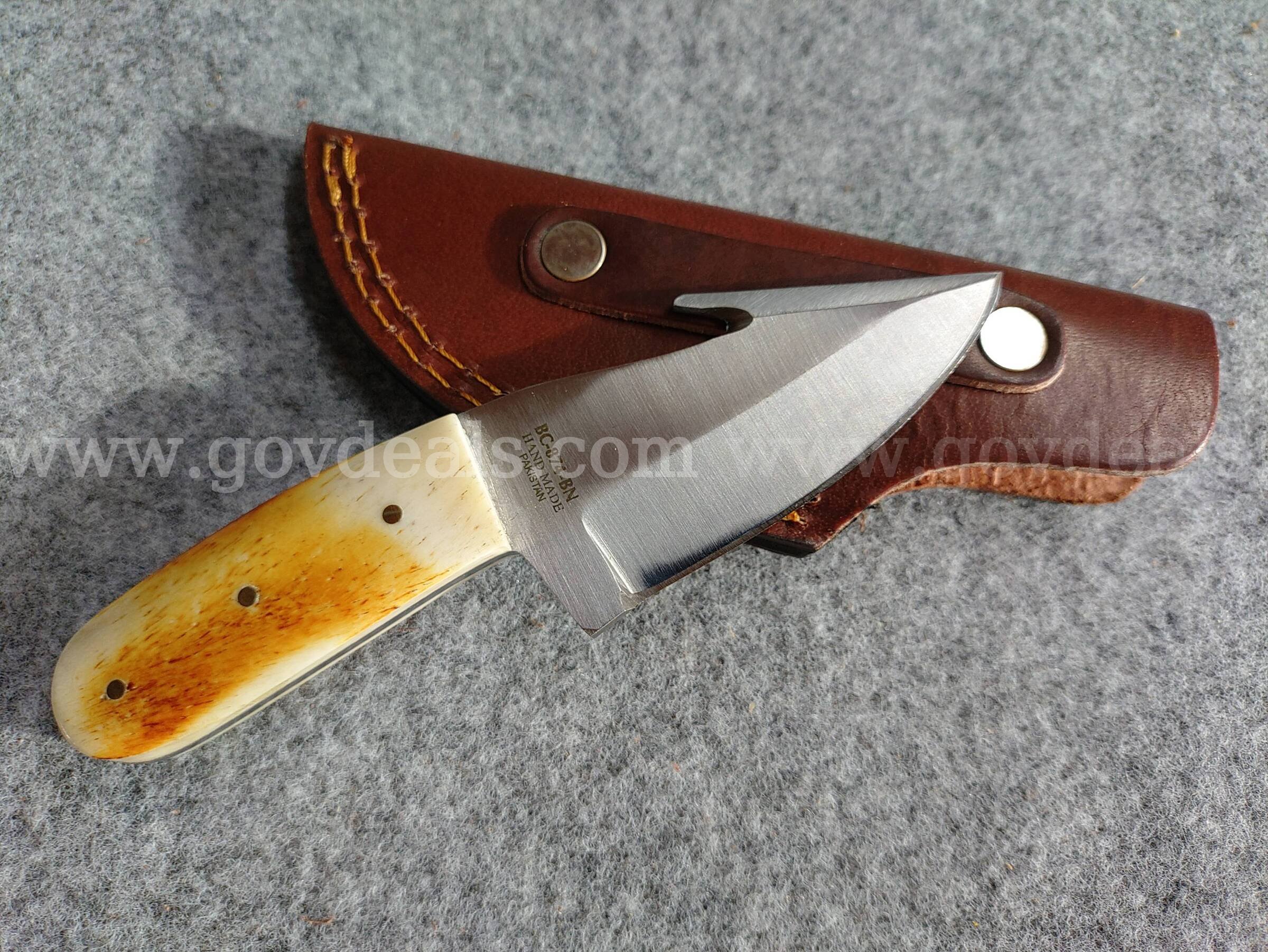 Bone Handle Skinner w/Gut Hook and Sheath The Bone Collector USA  Government Surplus Auction - Primary Photo