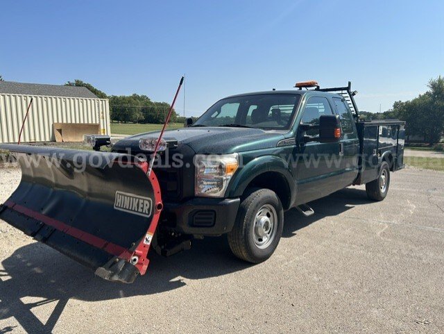 2011 Ford F-250 SD XL SuperCab 4WD (with and front-mounted snow plow, utility/service body, ladder rack, and lights) Ford F-250 Government Surplus Auction - Primary Photo
