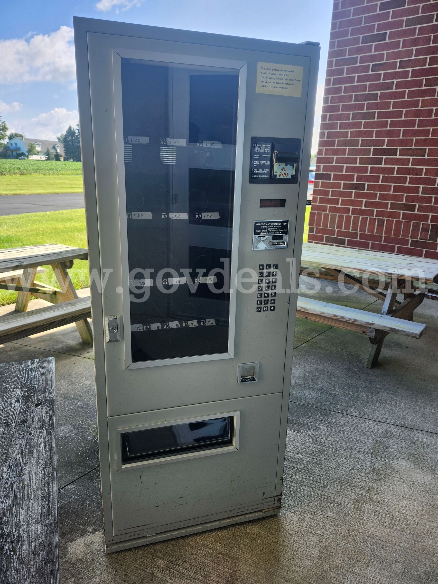 Vending machine that held various chips and candy bars.   Government Surplus Auction - Primary Photo