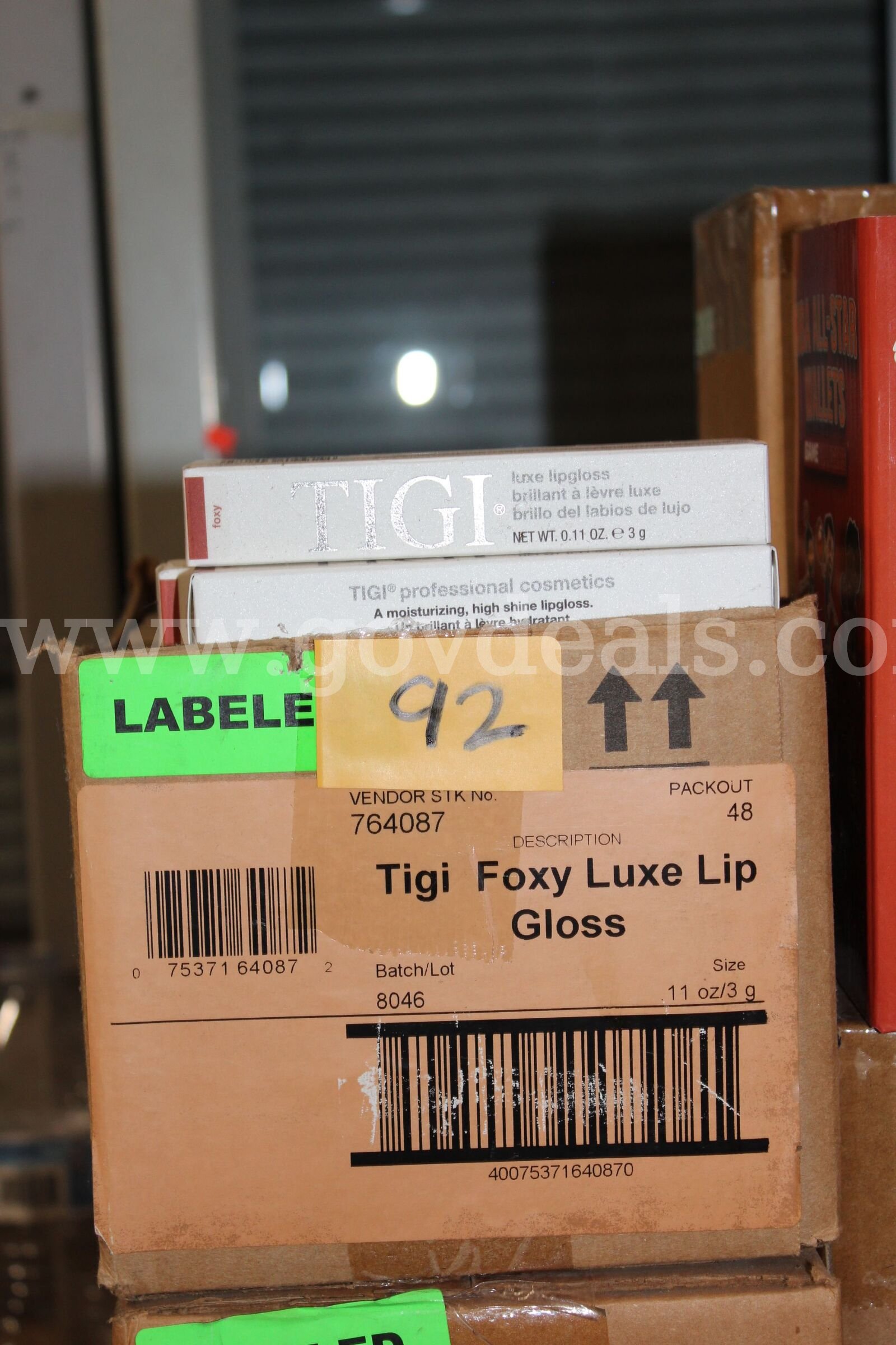 Tigi Cosmetics 764087 Luxe Lip Gloss In Foxy Color .11Fl Oz, lot contains 96 units.