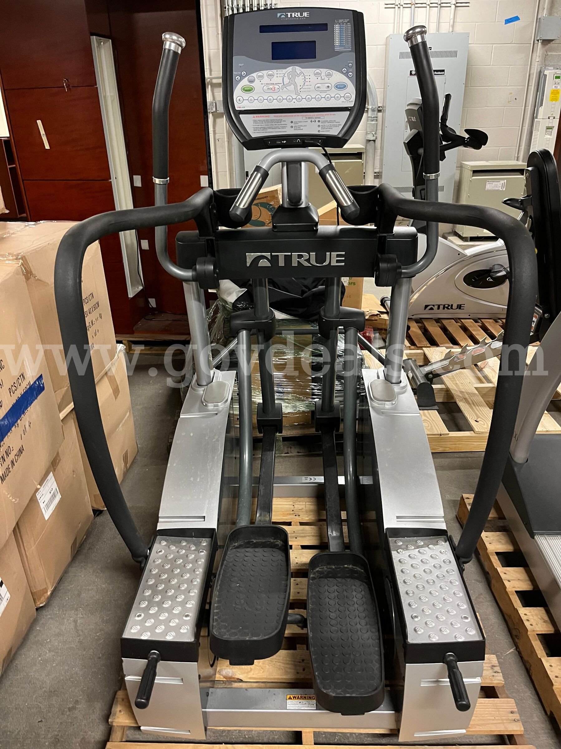 True Fitness Treadmill, Cross Trainer, Upright Bike, Bench with Dumbbells and Dumbbell Rack - Great Condition True Fitness  Government Surplus Auction - Photo #3