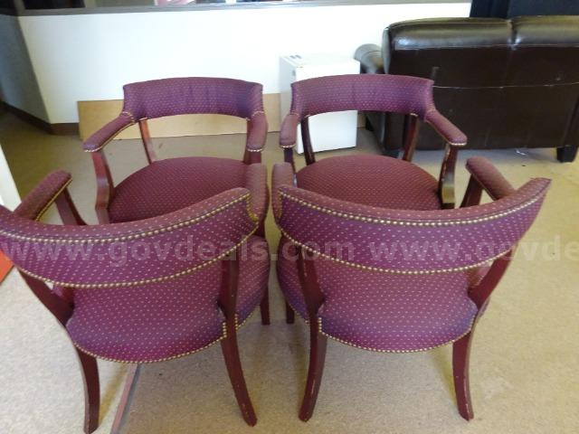 Lot of (4) Upholstered Burgundy Chairs with Arms.