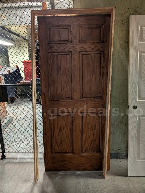 Lot of (1) Hollow Core 6 Panel Door and (1) Solid Core 6 Panel Door.