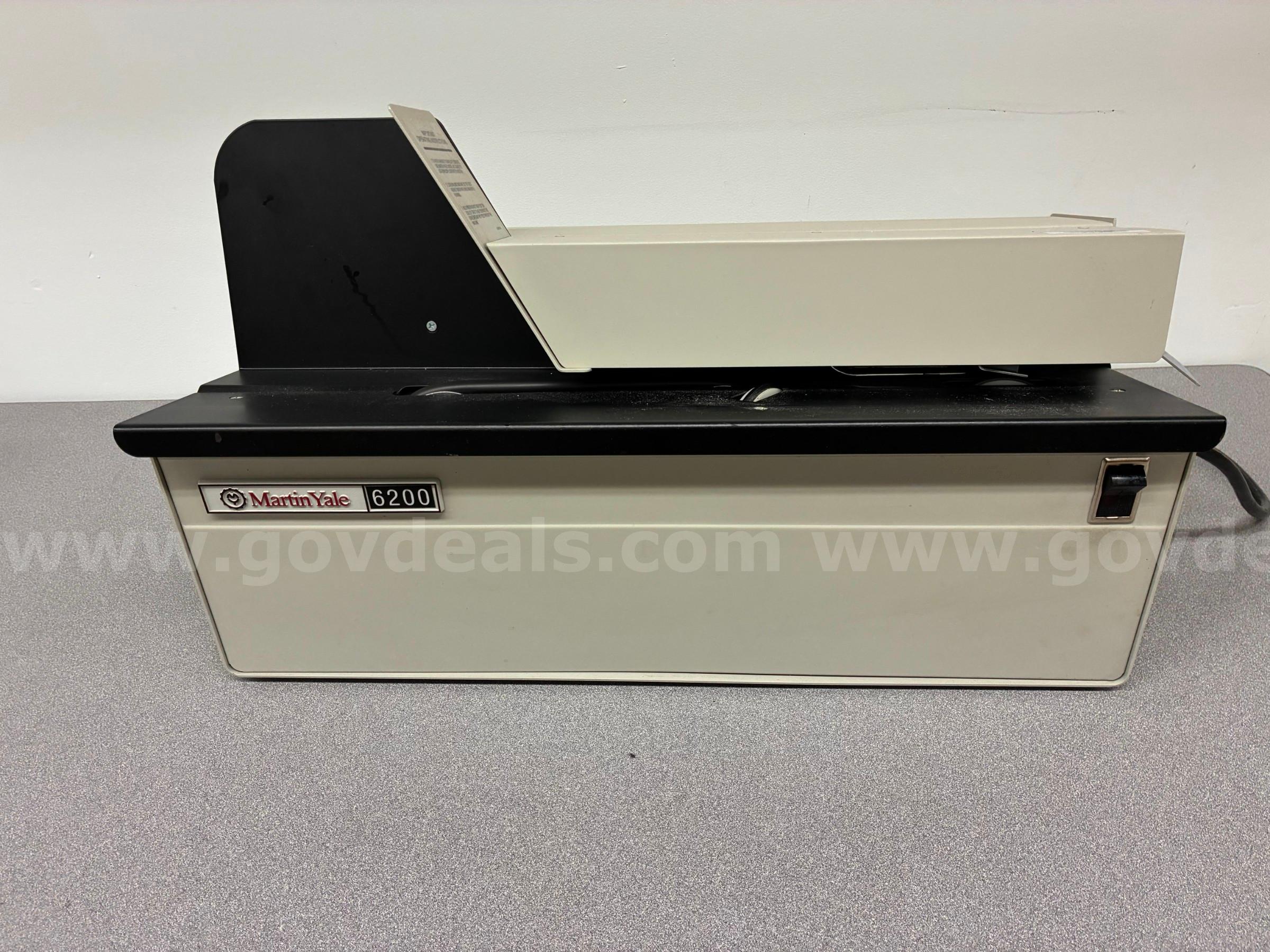 (1) Electric letter opener
