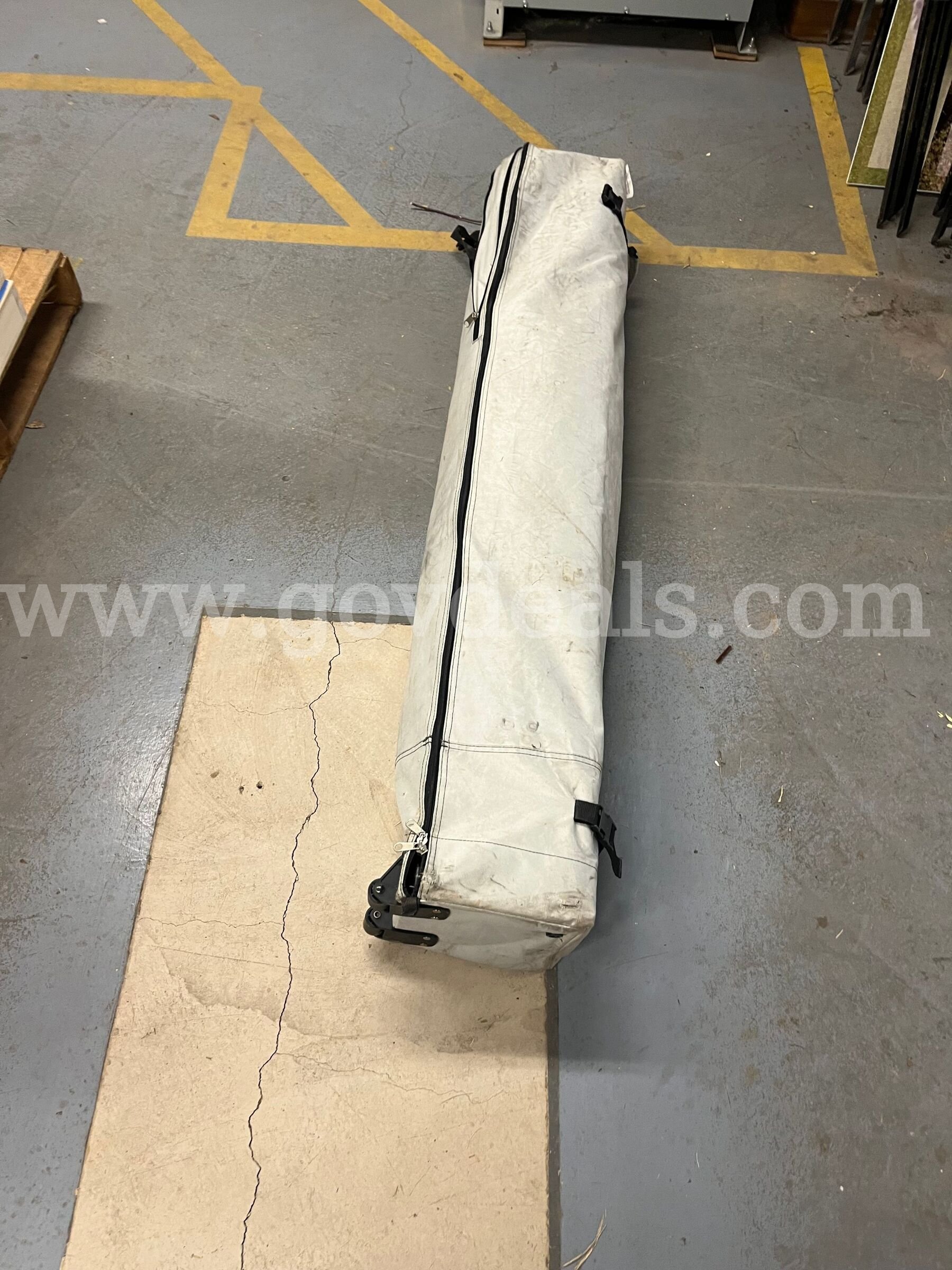 Brand: Ozark Trail Size: 12 ft x 12 ft canopy Covers up to 144 sq ft UV 50+ protection Ozark Trail 144 Government Surplus Auction - Photo #3
