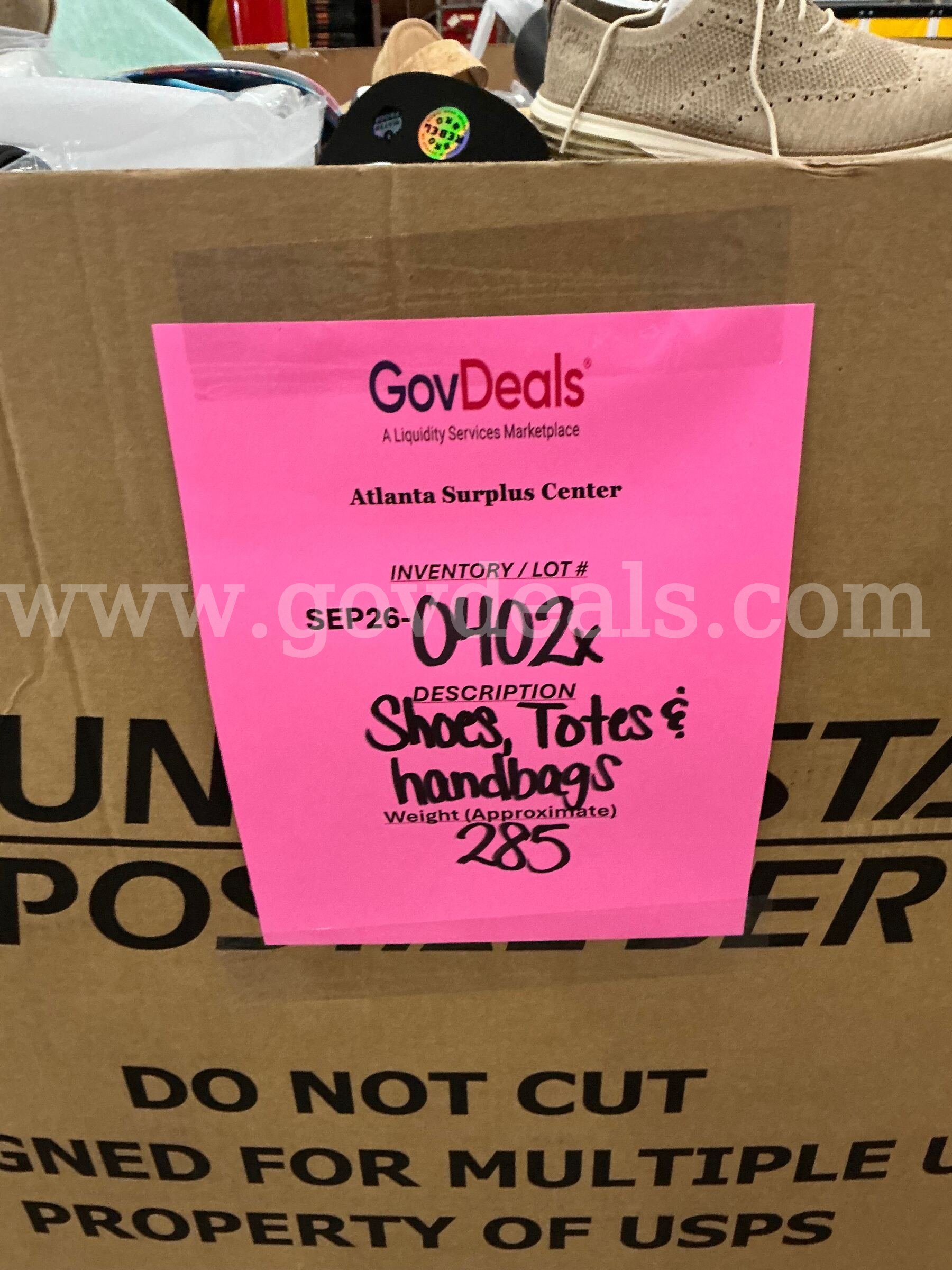 Apparel: Manually Sorted "Shoes, Handbags and Totes" (SEP26-0402X)   Government Surplus Auction - Photo #2