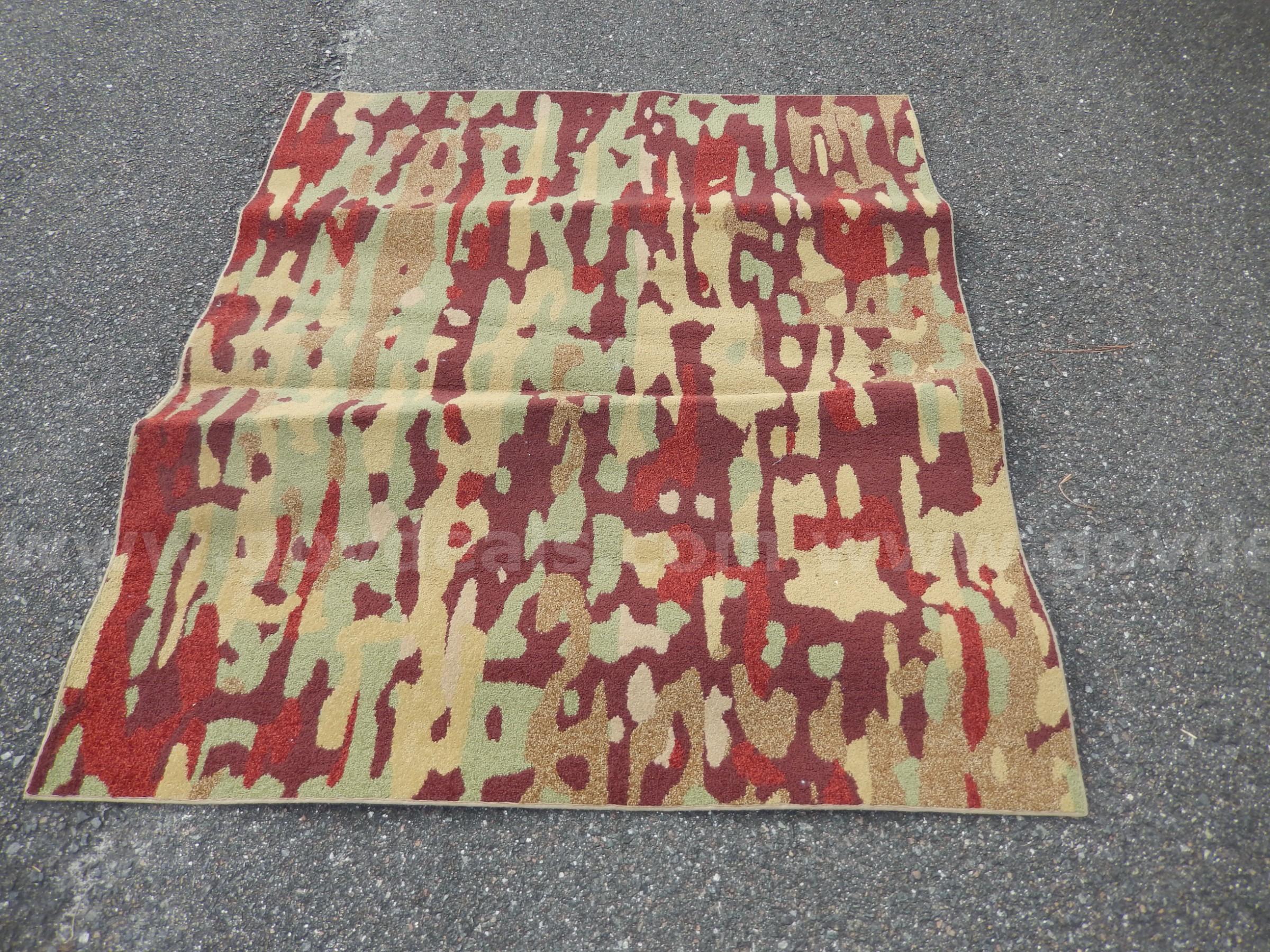 USED (1) LARGE TAN PATTERN RUG 70" x 60"