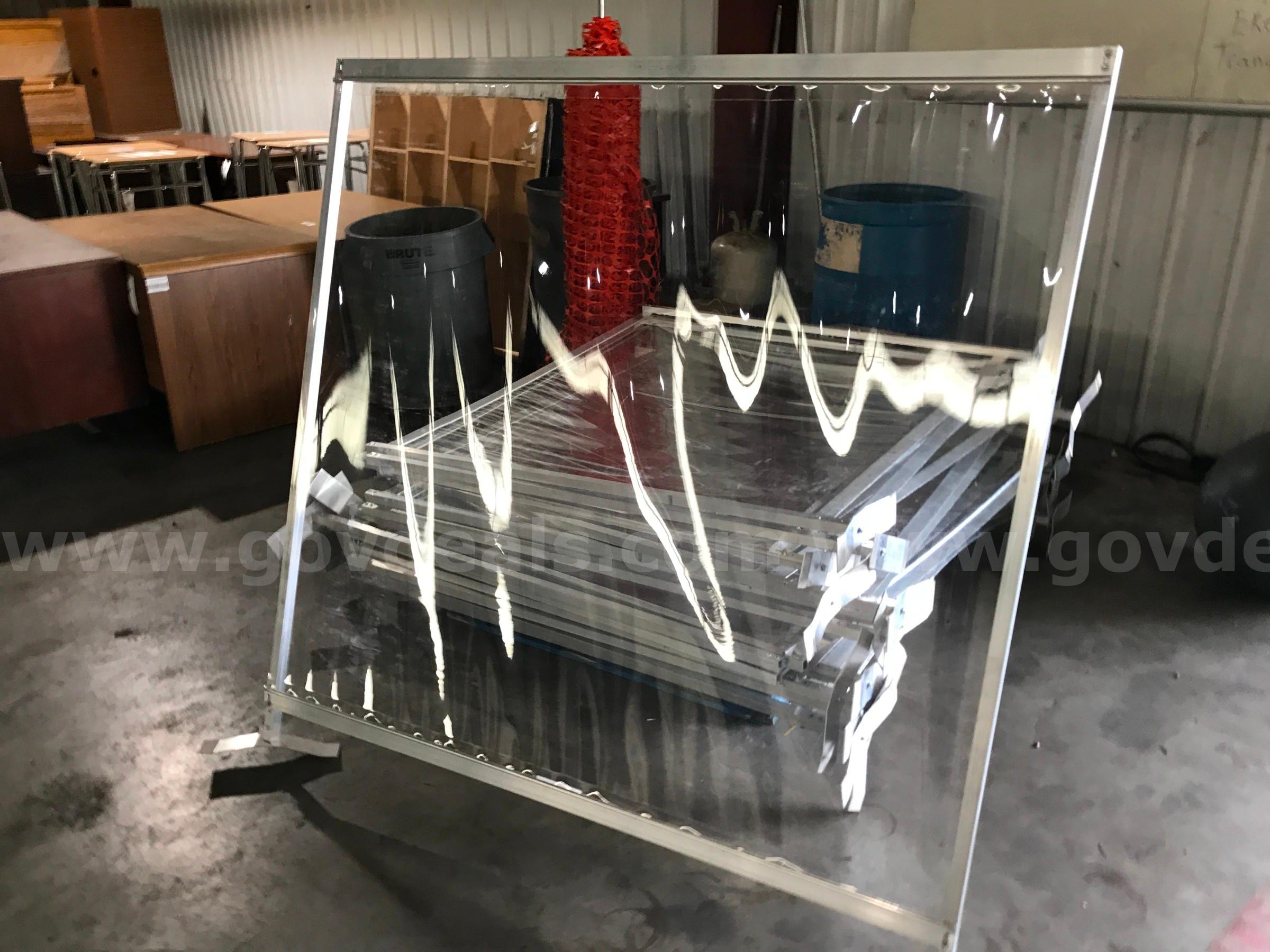 CLEAR PLASTIC DIVIDERS ON ONE PALLET.