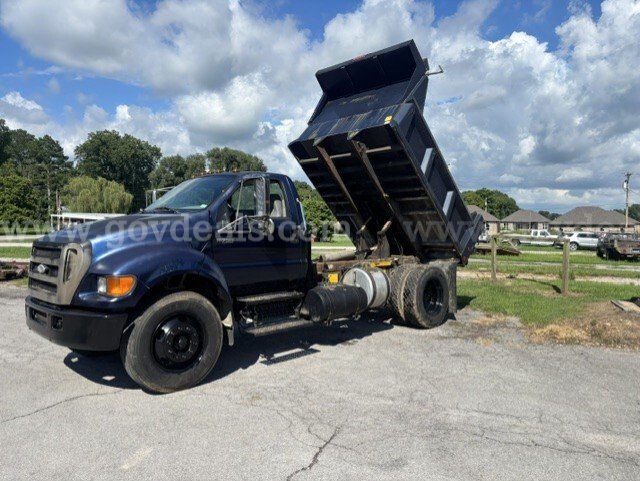 Ford F-750 Dump Truck with a Cummins ISB- 245 Diesel Engine with an automatic transmission.
