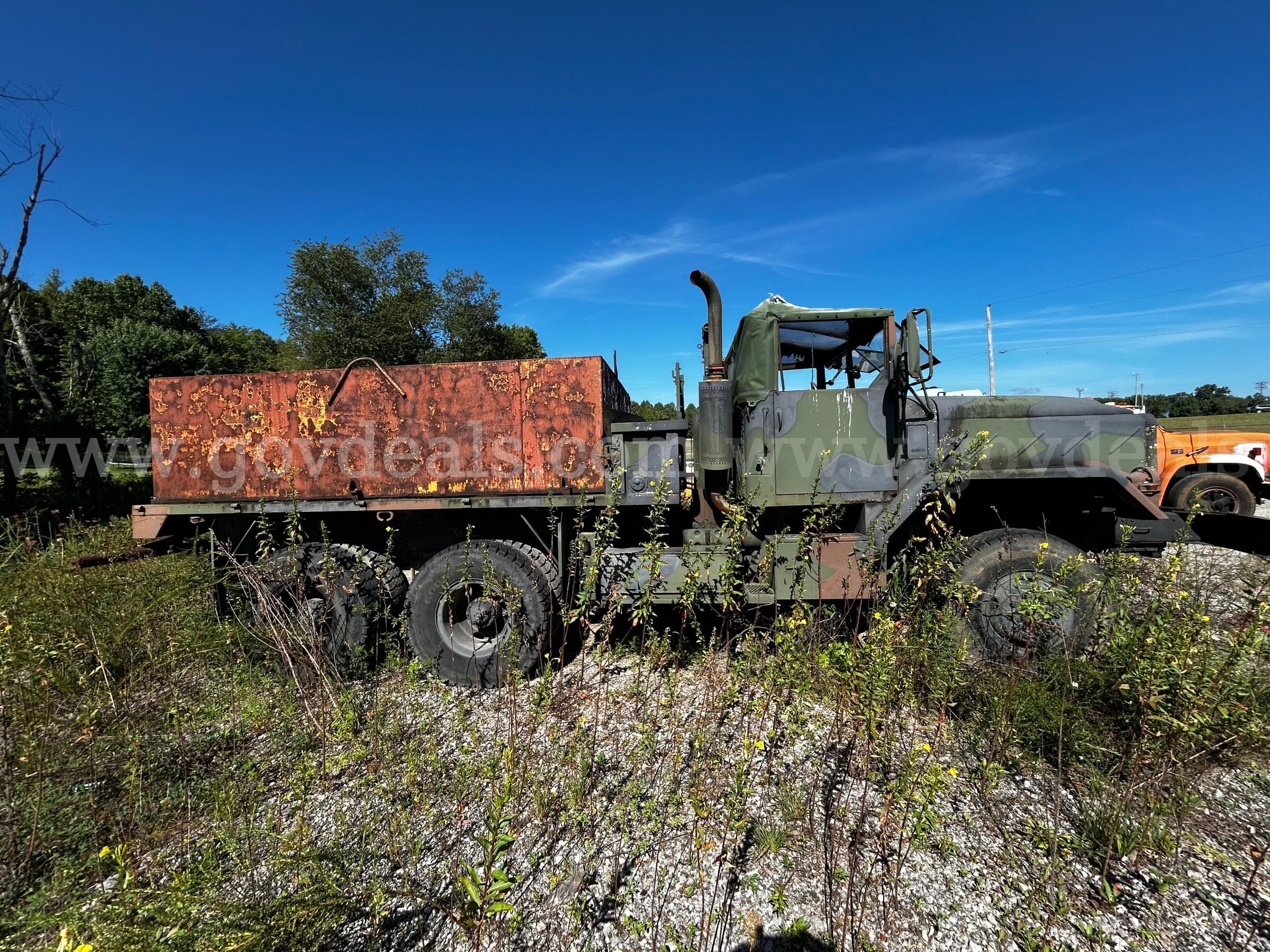 AM General 5-Ton Military Cargo Truck with Front Winch (Water Truck) AM General  Government Surplus Auction - Photo #2