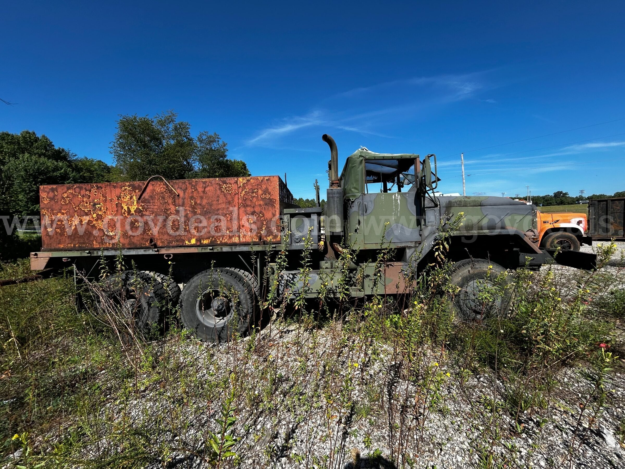 AM General 5-Ton Military Cargo Truck with Front Winch (Water Truck) AM General  Government Surplus Auction - Photo #3
