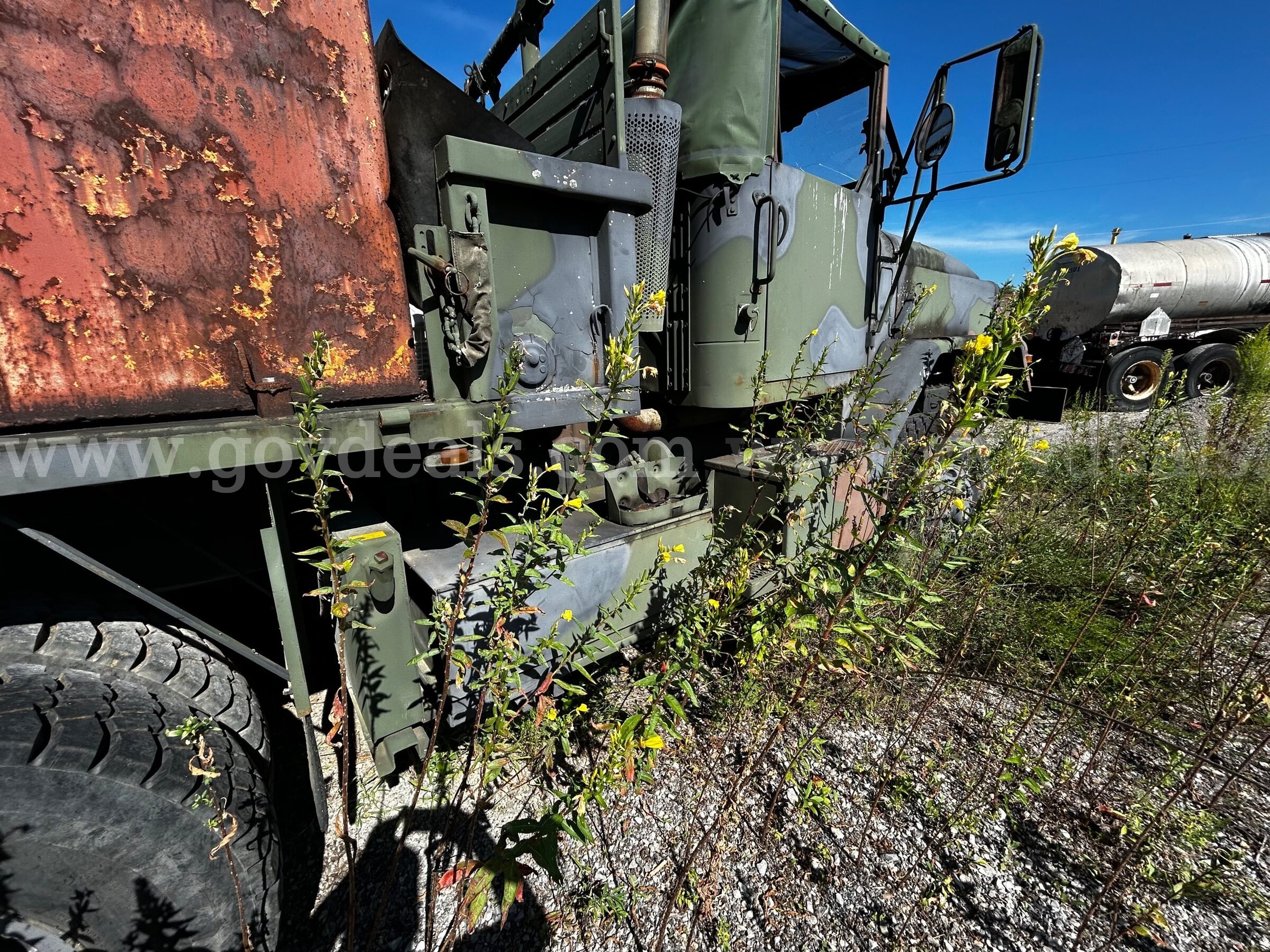 AM General 5-Ton Military Cargo Truck with Front Winch (Water Truck) AM General  Government Surplus Auction - Photo #4