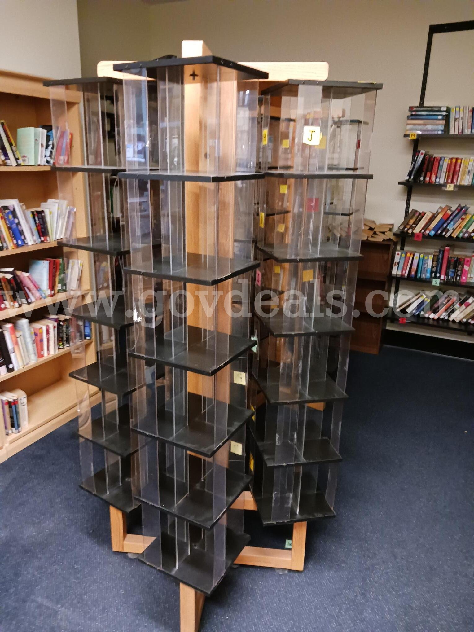 USED - 4-sided Spinner Display Unit   Government Surplus Auction - Primary Photo