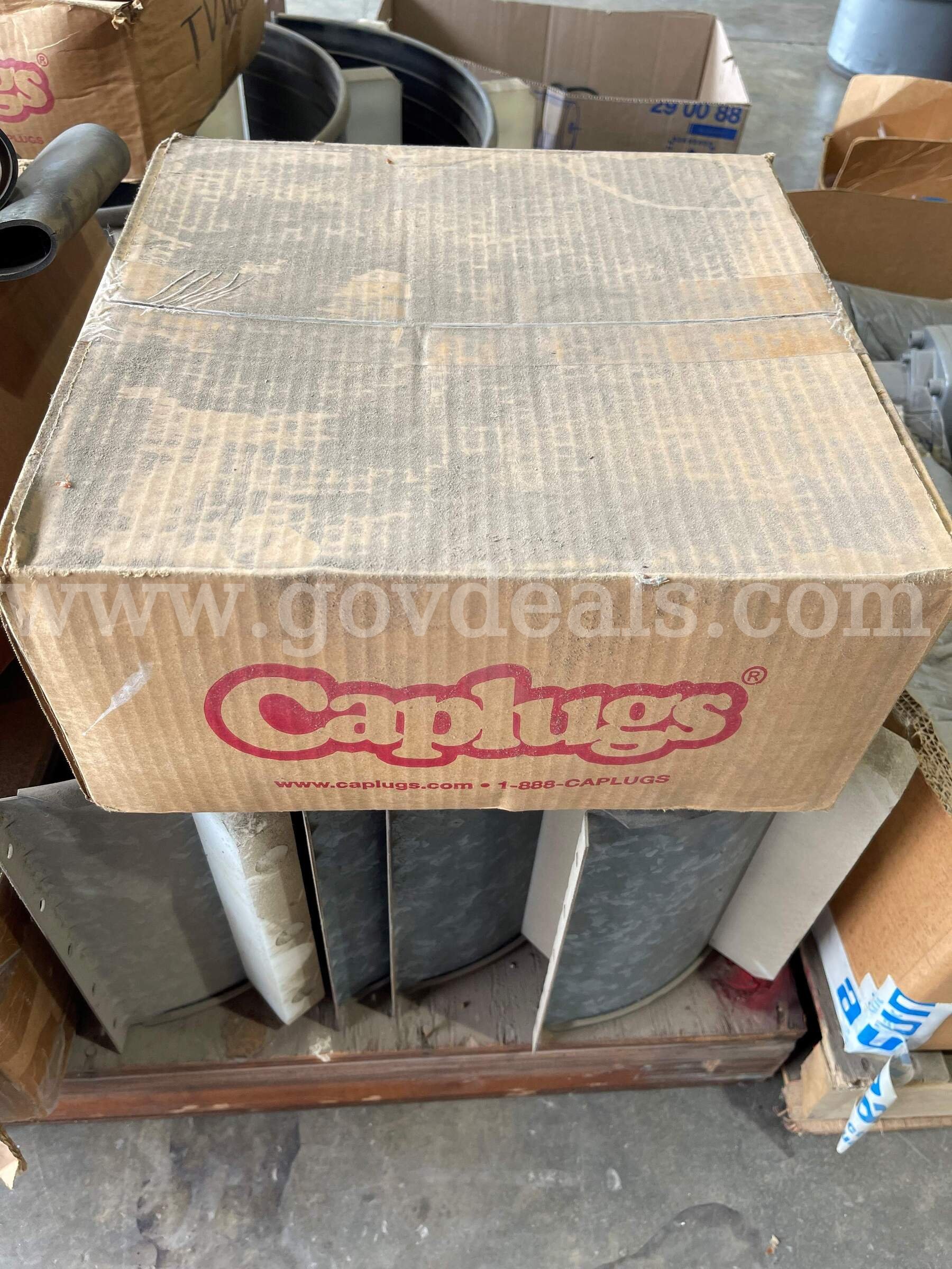 *UNOPENED* Box of caps   Government Surplus Auction - Primary Photo
