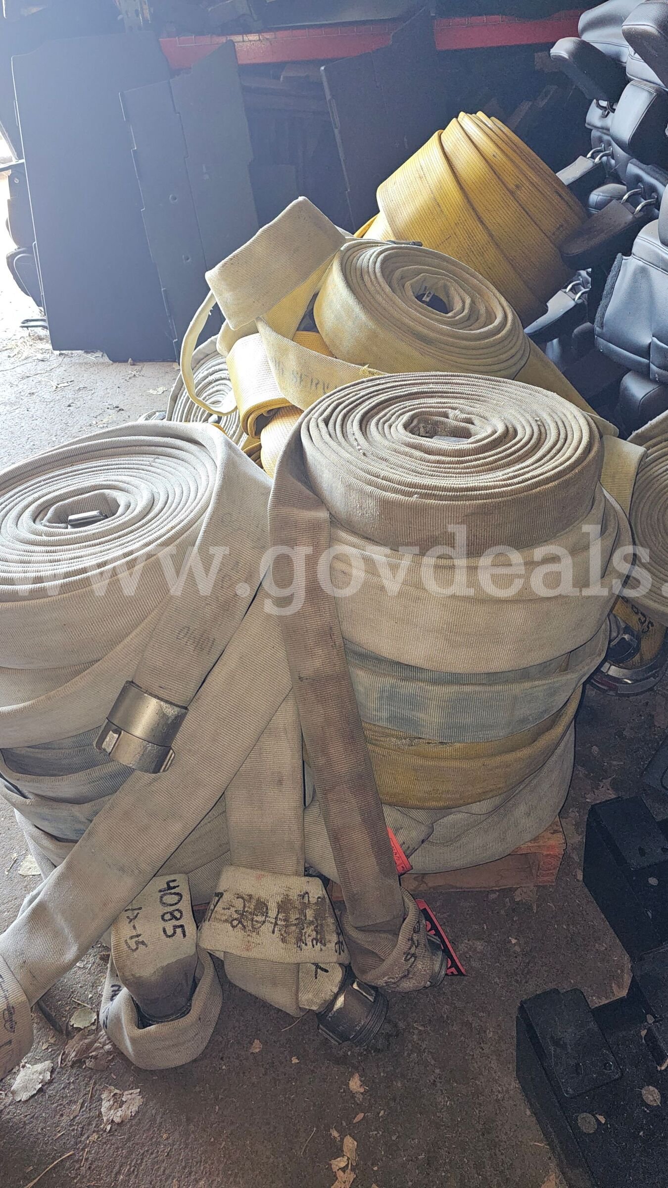 Large assortment of used fire hose for sale.   Government Surplus Auction - Photo #2