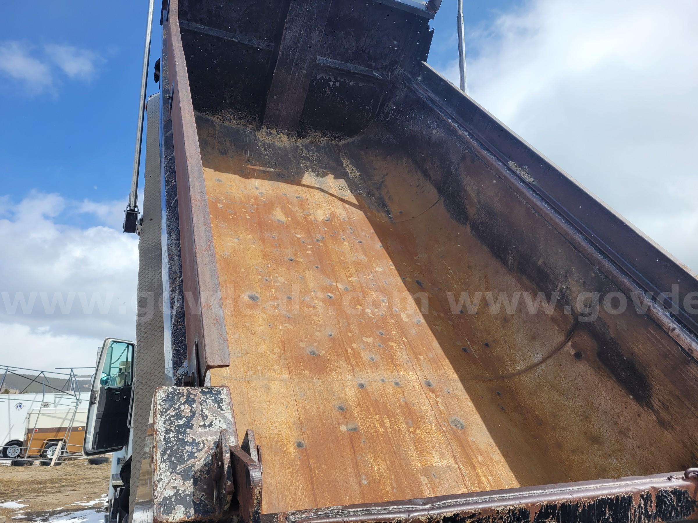1997 Volvo WG Dump Truck – Runs Strong, Working Dump Bed Volvo WG Government Surplus Auction - Photo #5
