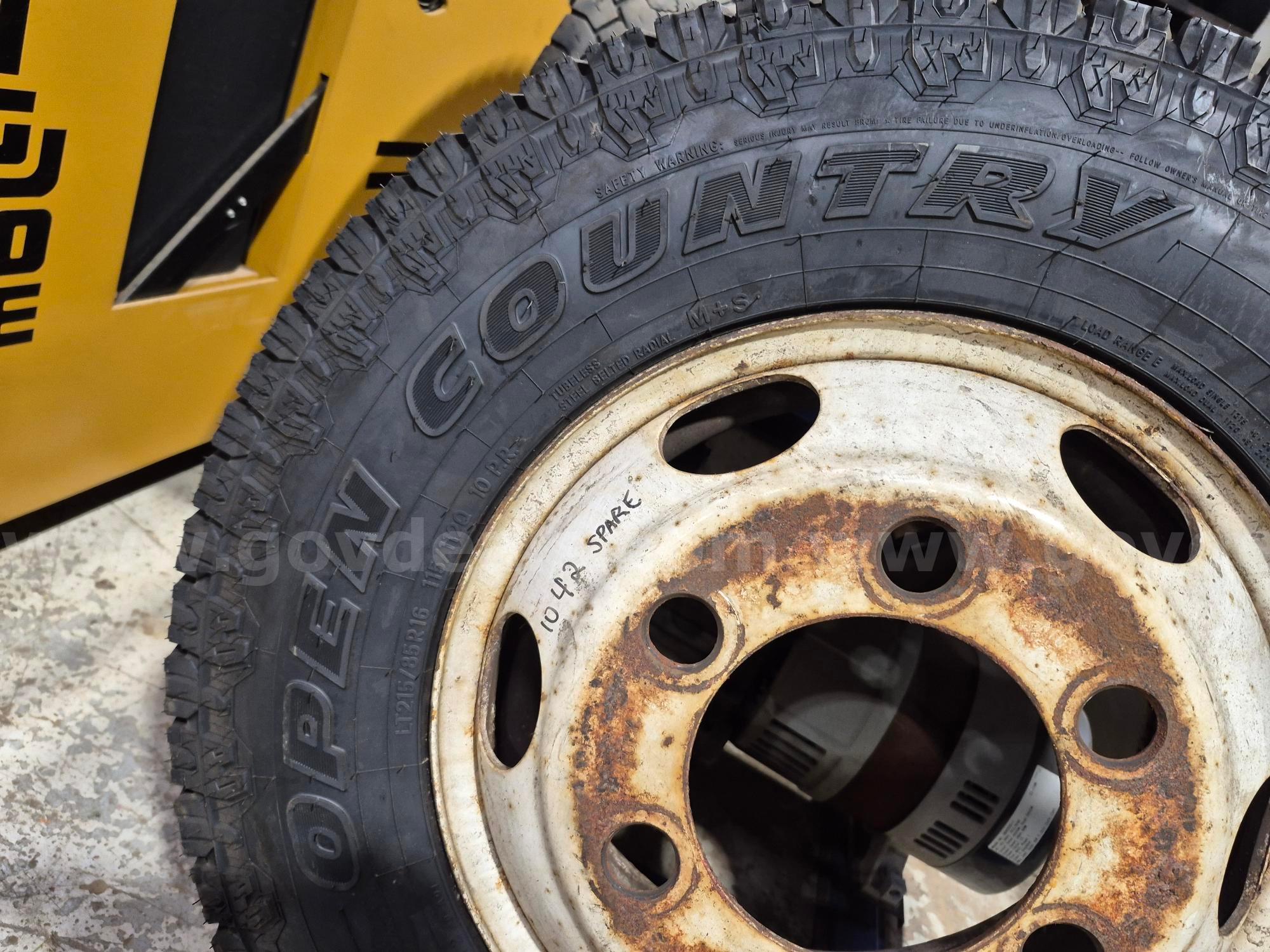 Isuzu NPR truck wheel & tire Isuzu NPR wheel & tire Government Surplus Auction - Photo #2