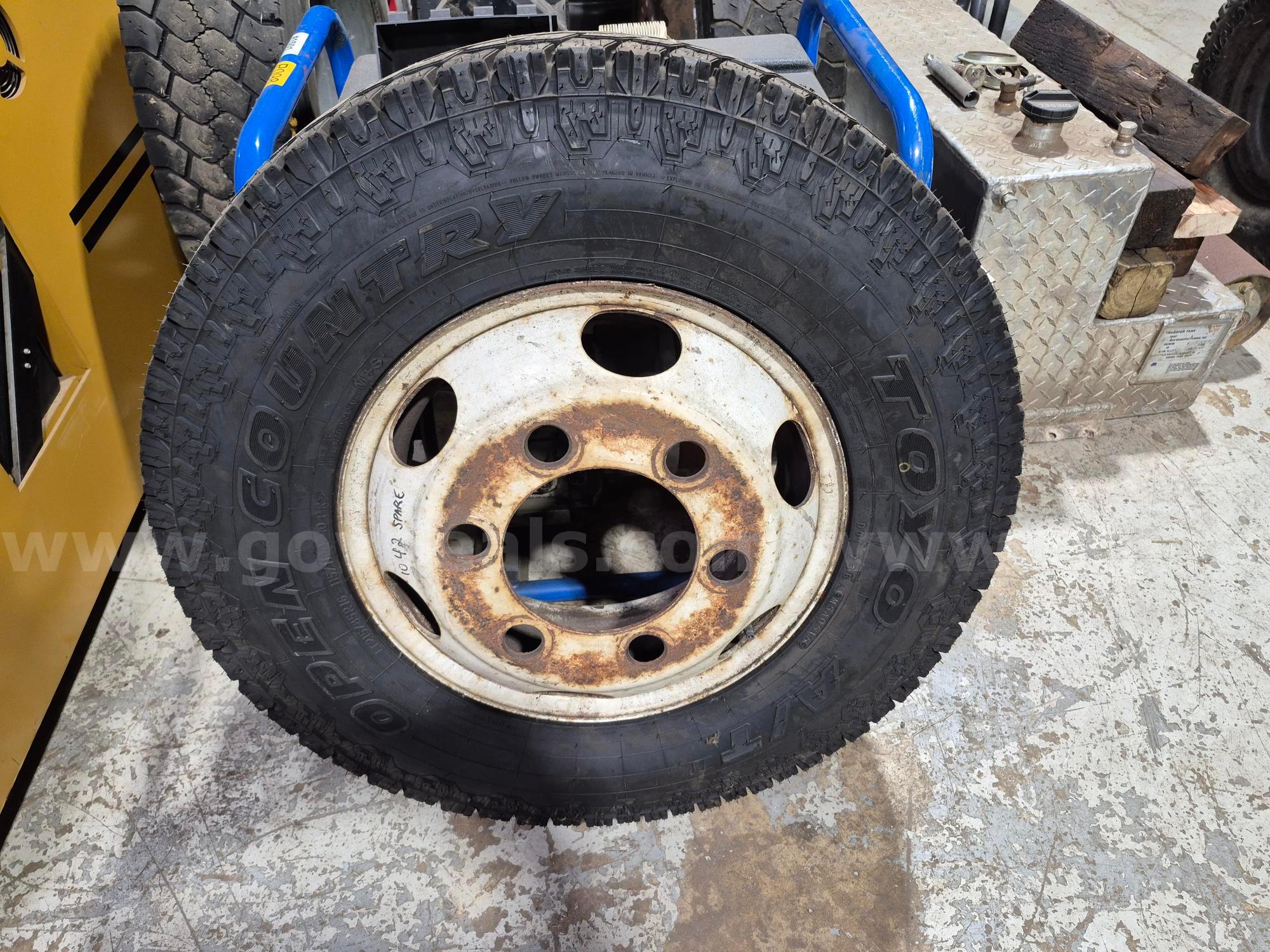 Isuzu NPR truck wheel & tire Isuzu NPR wheel & tire Government Surplus Auction - Photo #3