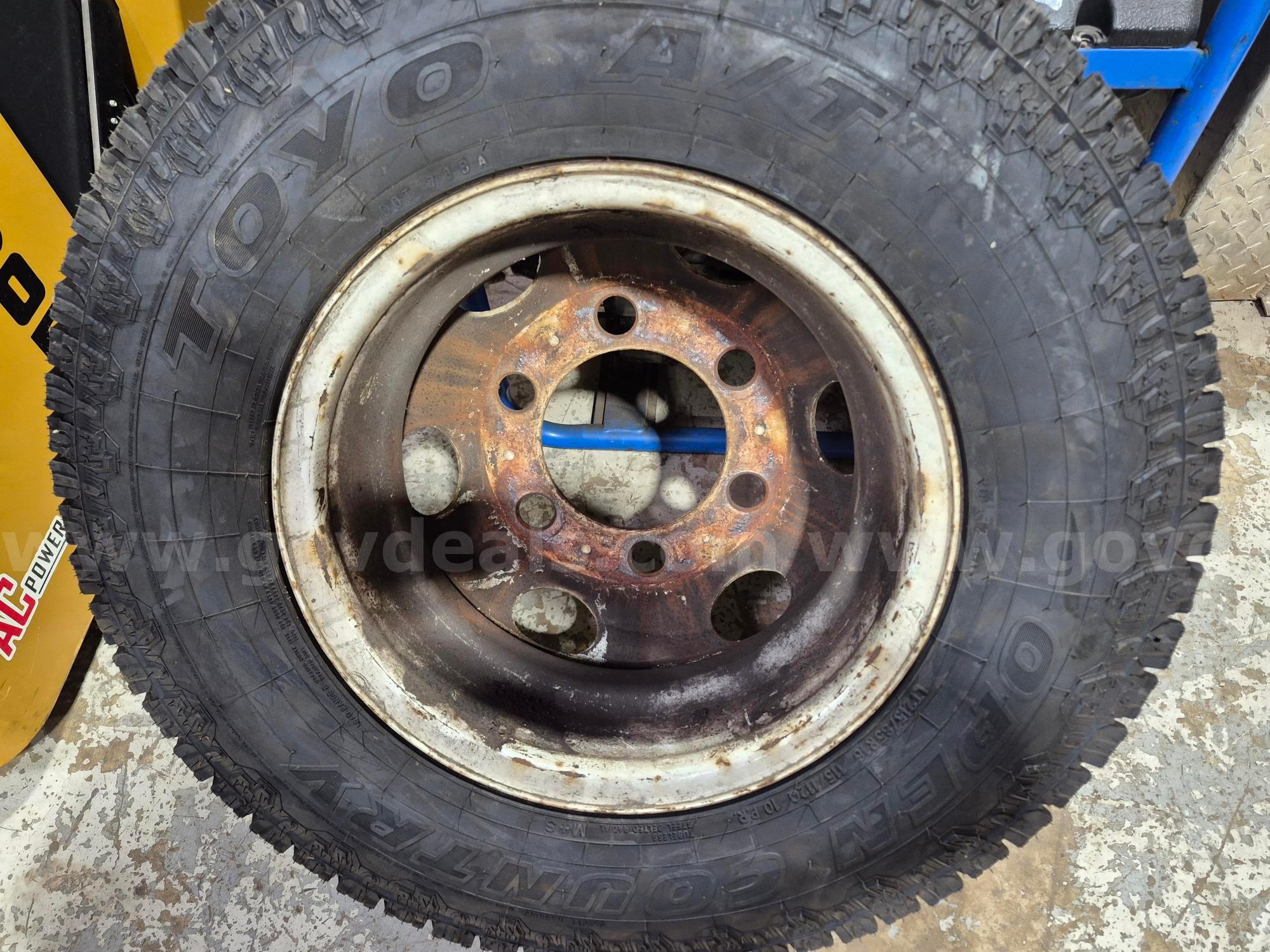 Isuzu NPR truck wheel & tire Isuzu NPR wheel & tire Government Surplus Auction - Photo #5