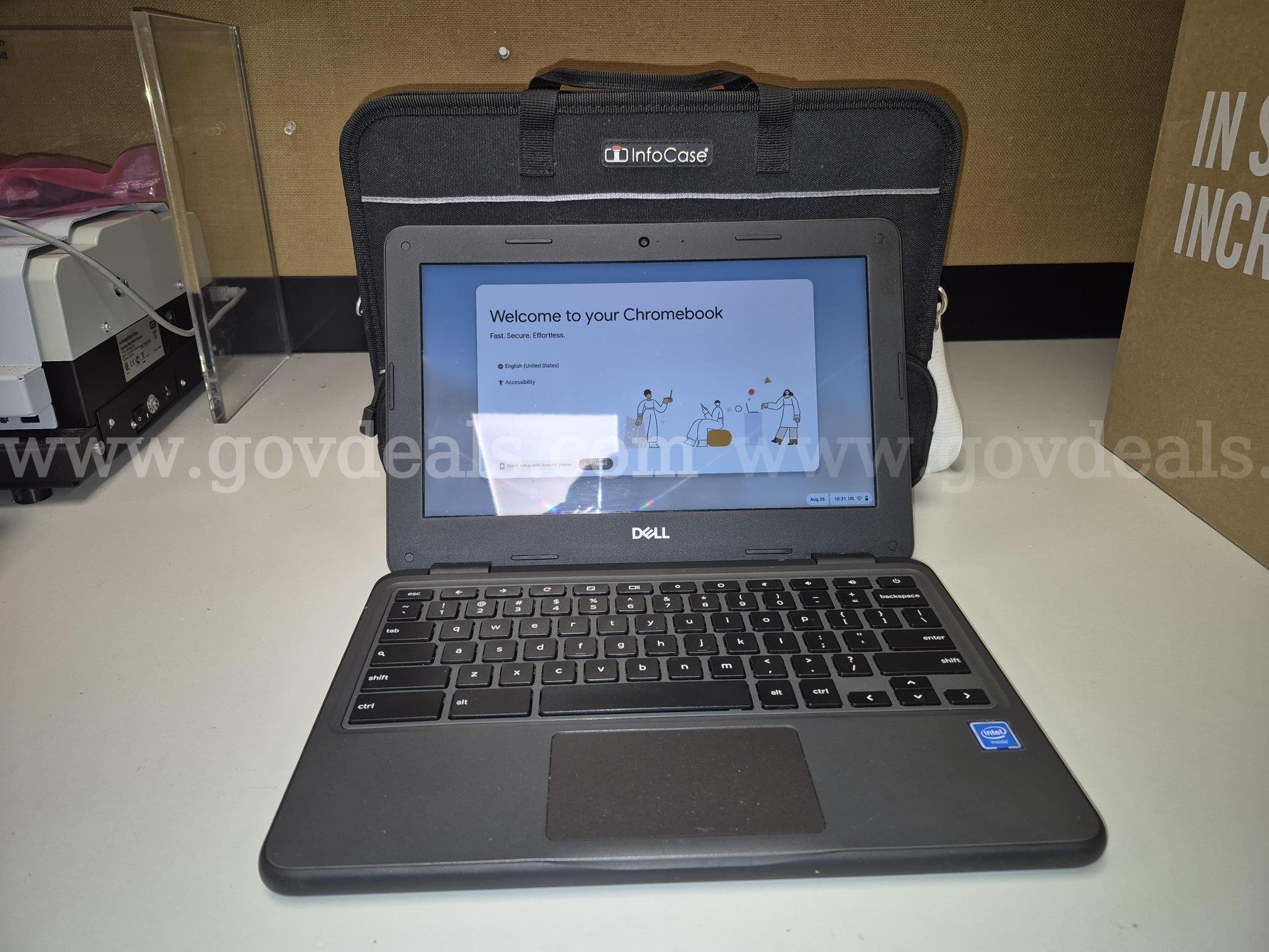 Dell 11.6" Chromebook 3100 with cases. Most also have a power supply. Total of 17. Dell 3100 Government Surplus Auction - Primary Photo