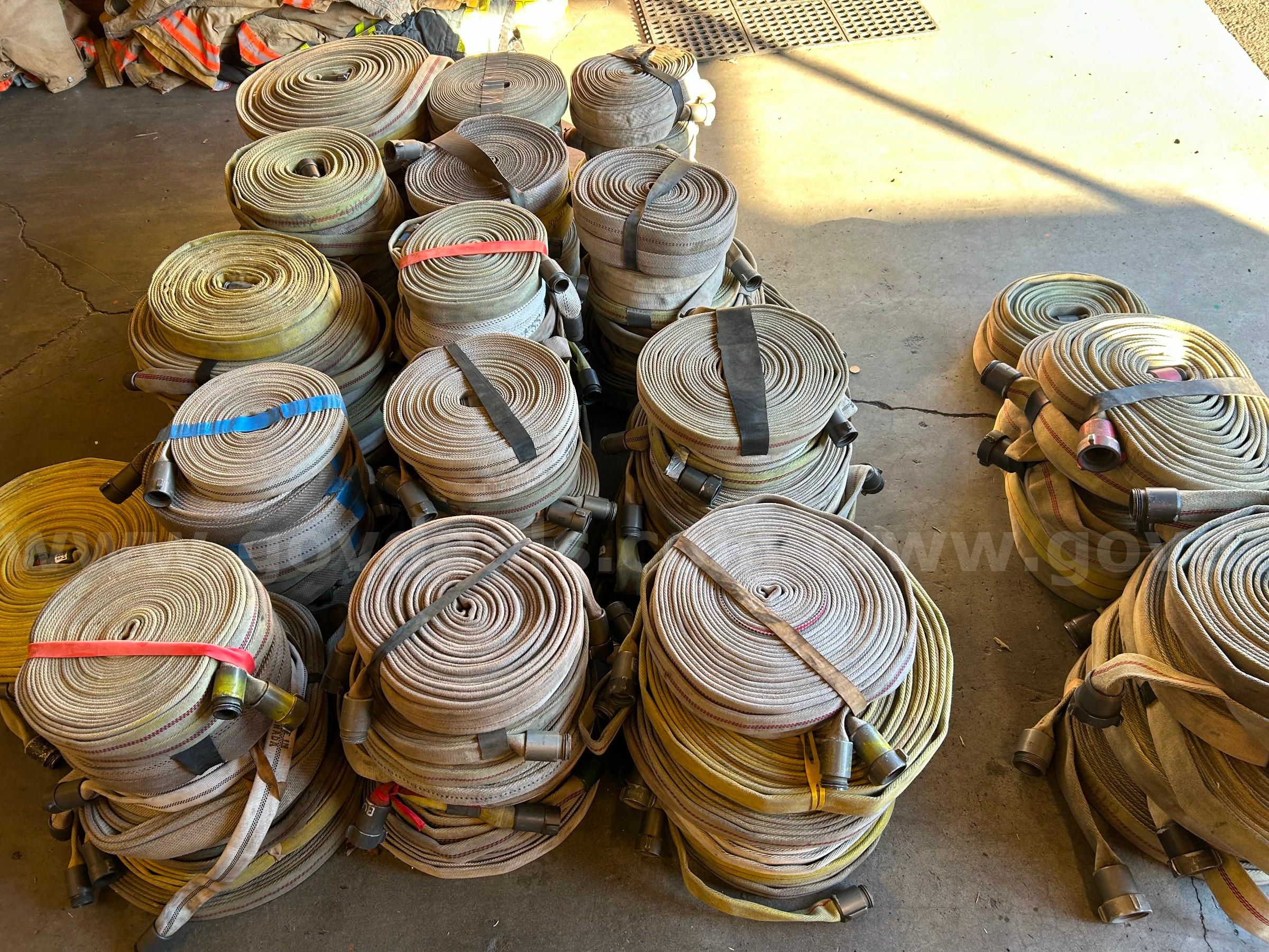 Bulk lot of wildland fire hose.