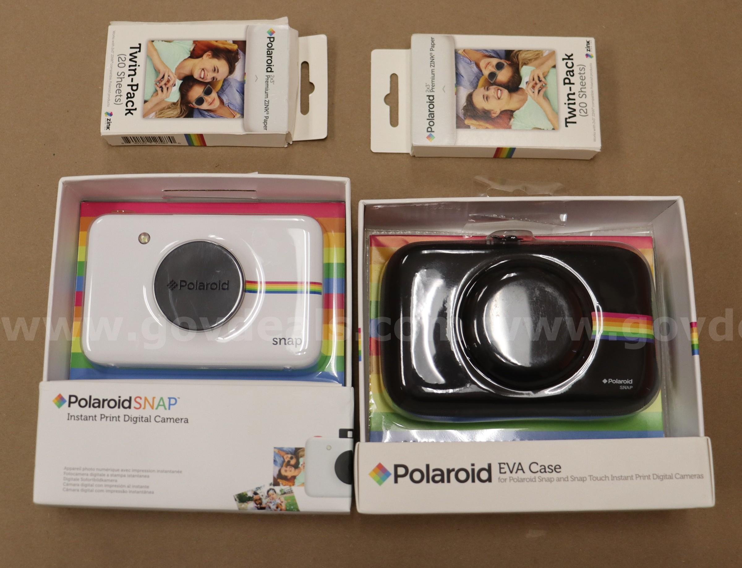 Polaroid SNAP Instant Camera w/ case & paper Polaroid SNAP Government Surplus Auction - Primary Photo
