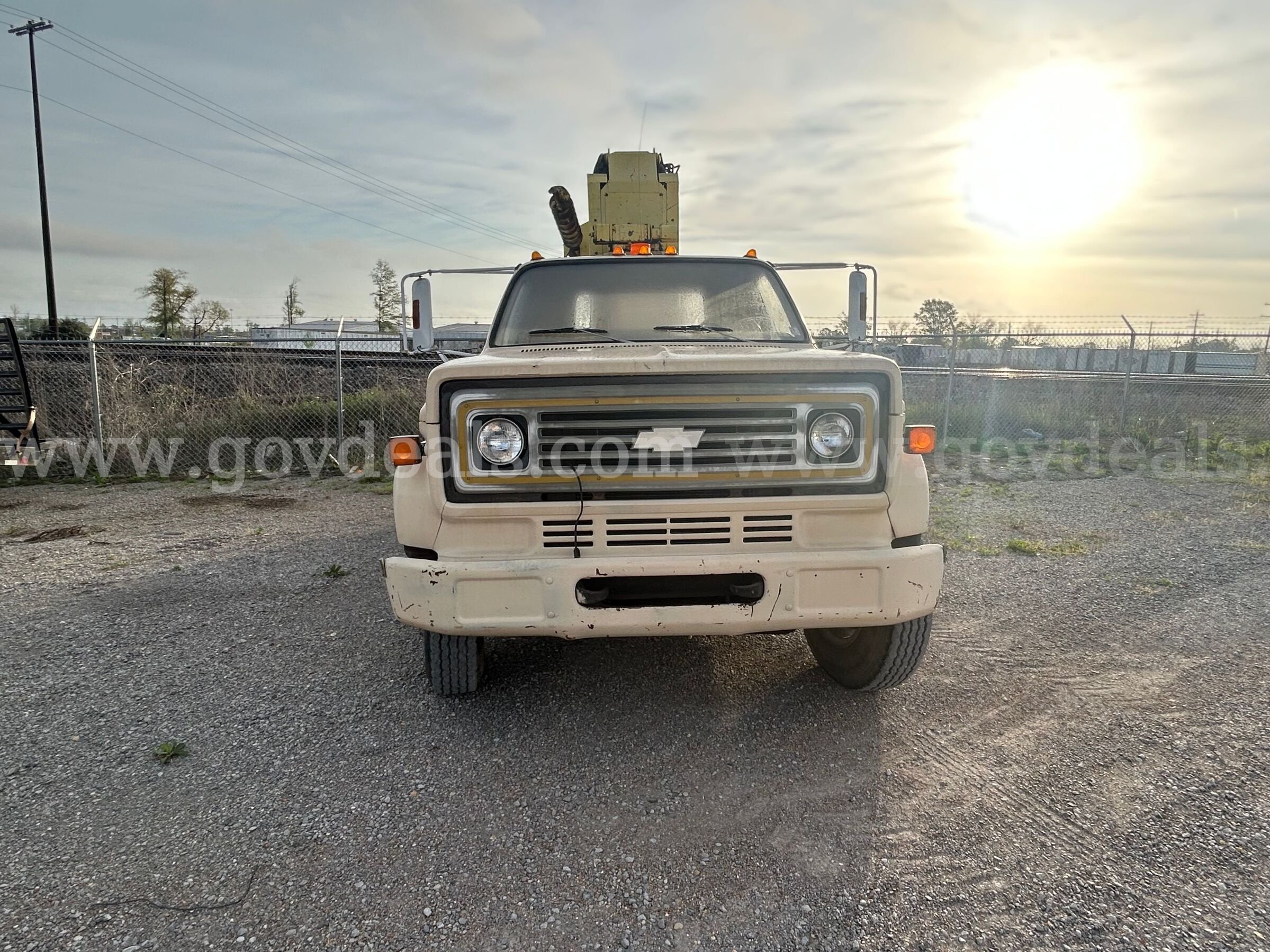 1986 Chevrolet Diesel with a front mounted digger derrick Chevrolet  Government Surplus Auction - Photo #2